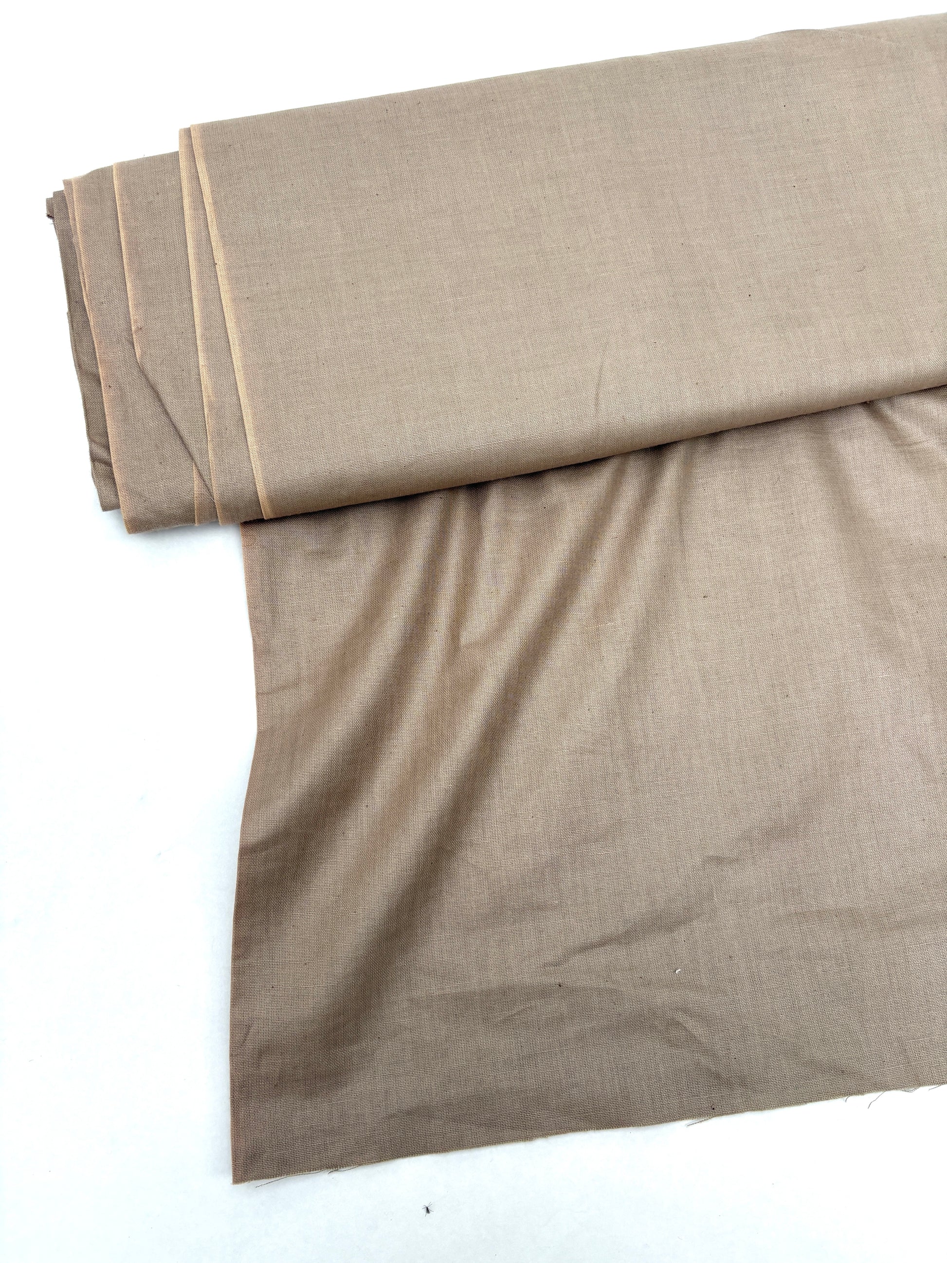 Folded waxy finishing natural fibre taffeta fabric in dark khaki
