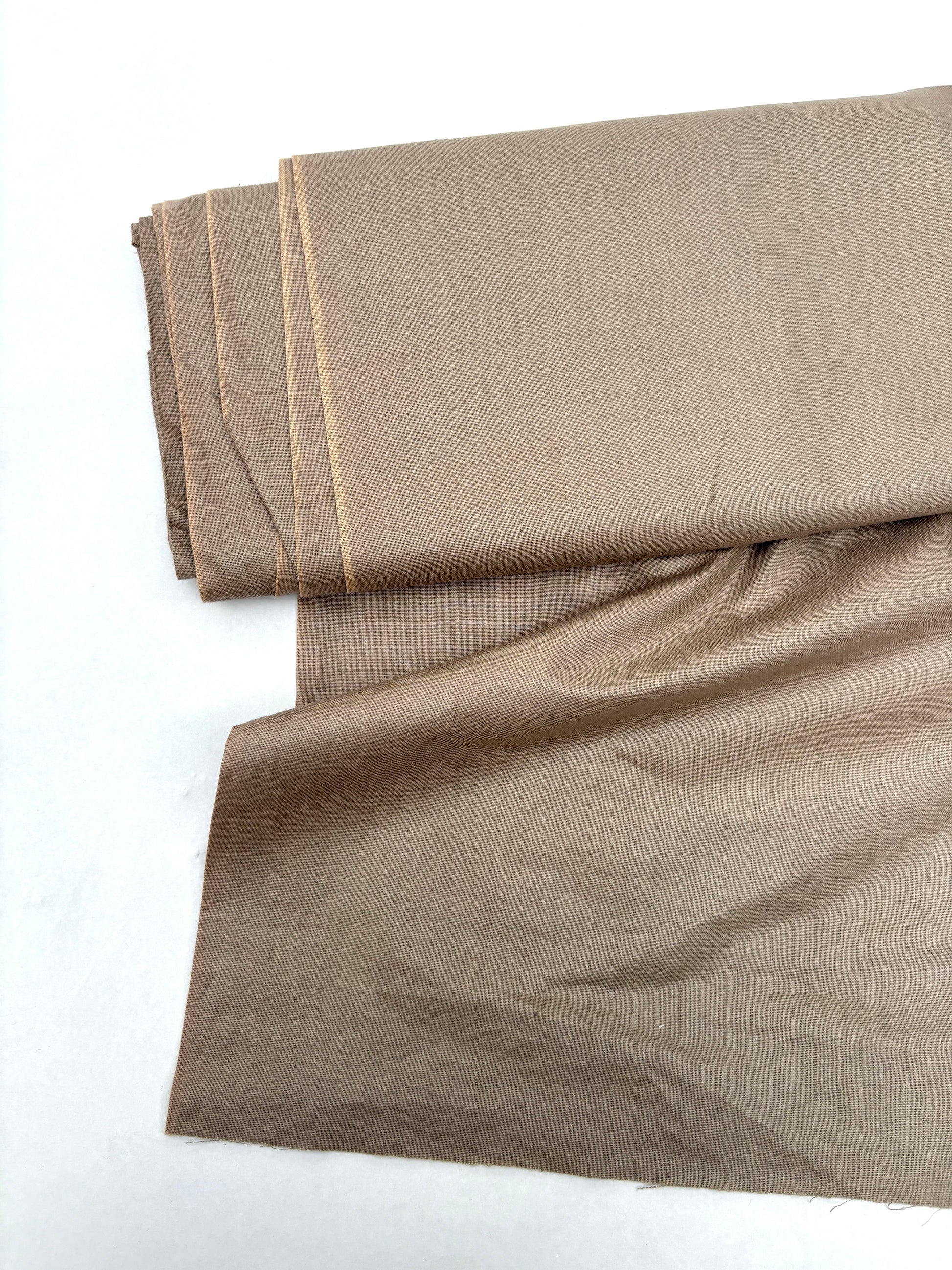 Folded waxy finishing natural fibre taffeta fabric in dark khaki