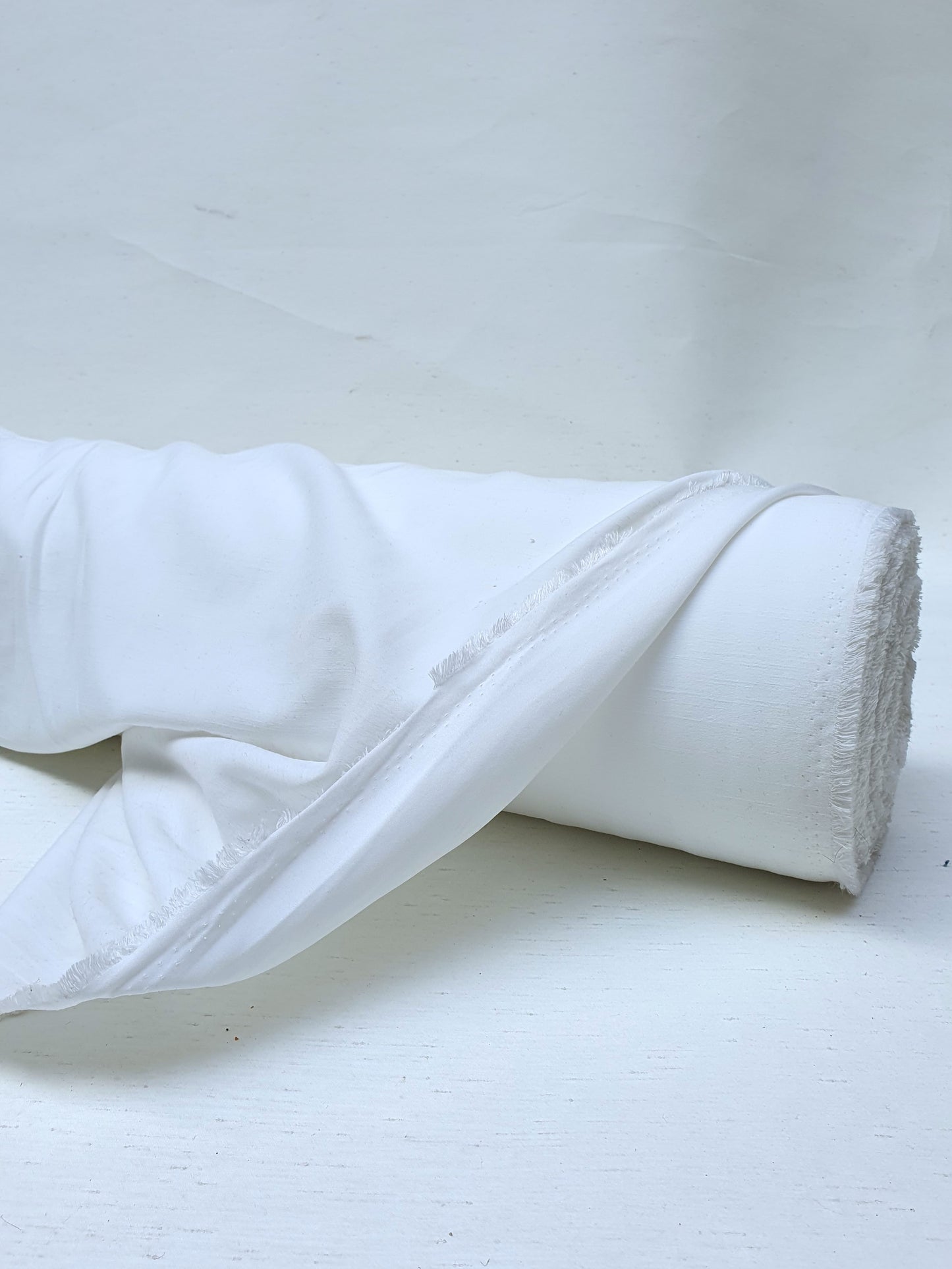 Roll of polyester fabric in Nevada white 