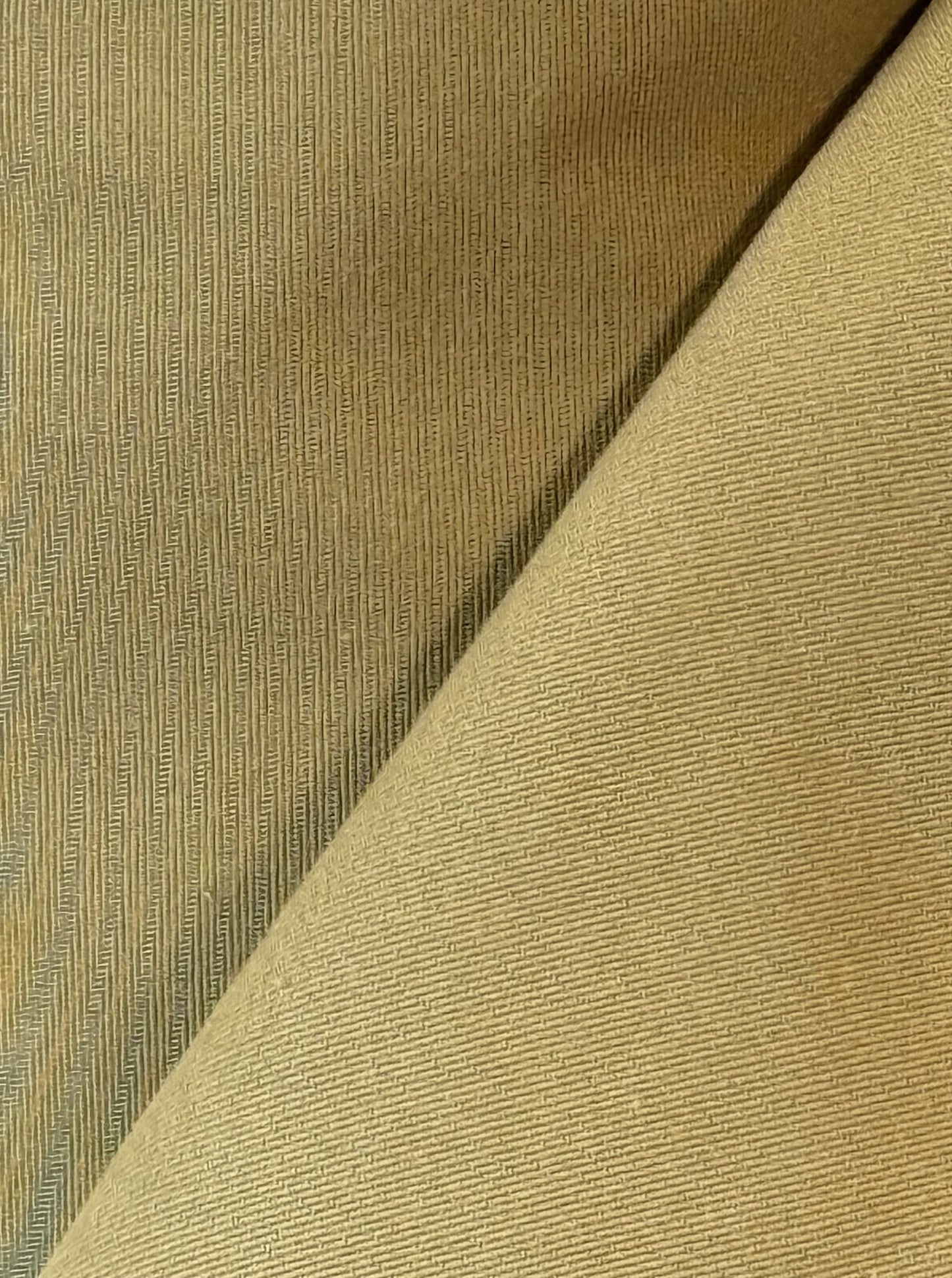 Close-up of organic cotton blended with recycled nylon fabric in beige