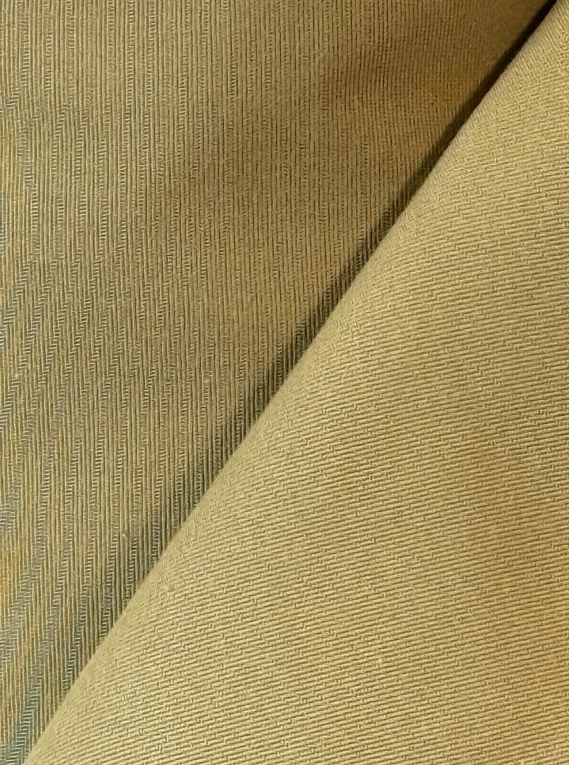 Close-up of organic cotton blended with recycled nylon fabric in beige
