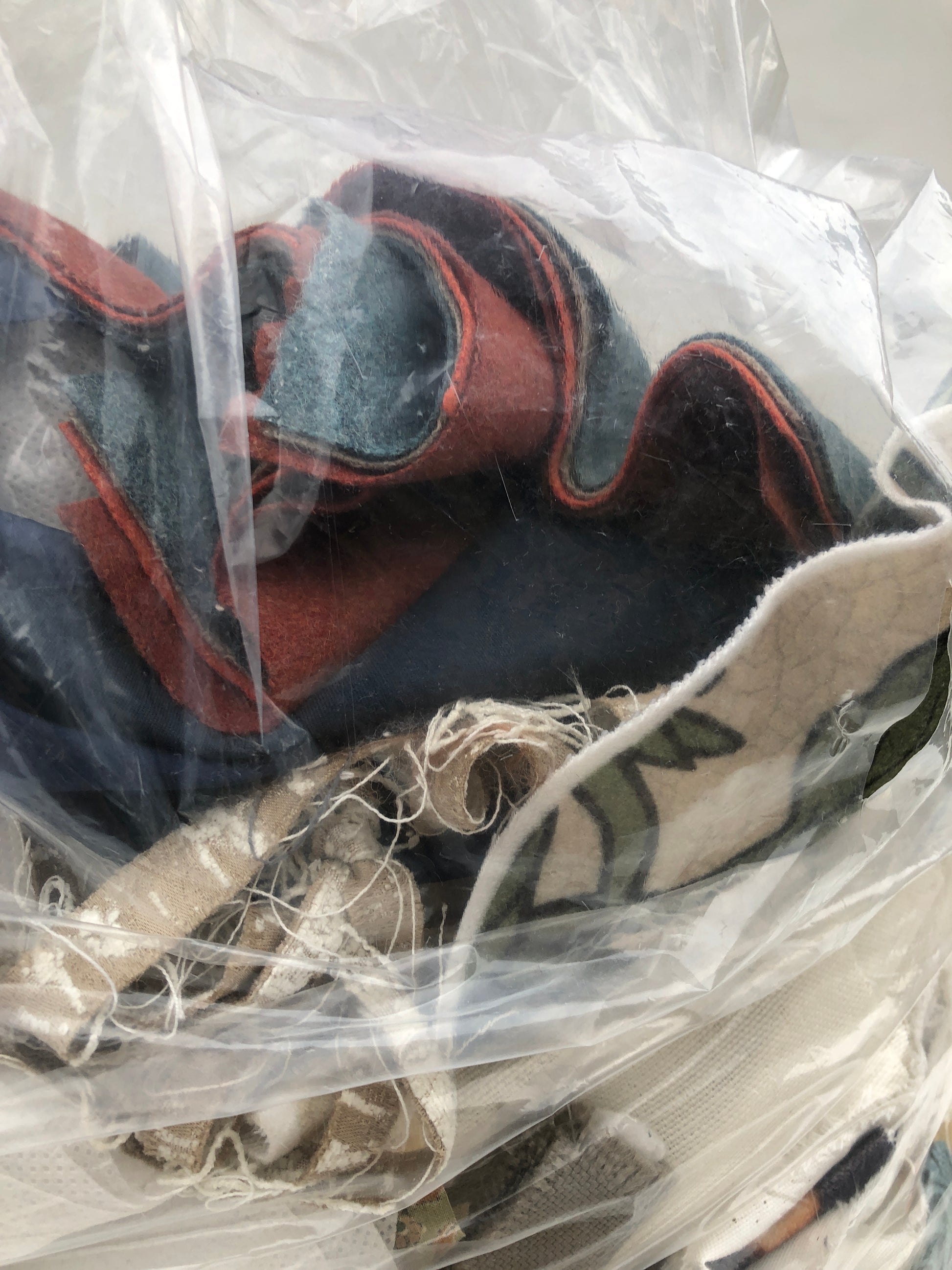 Collection of fabric remnants in various patterns and textures 