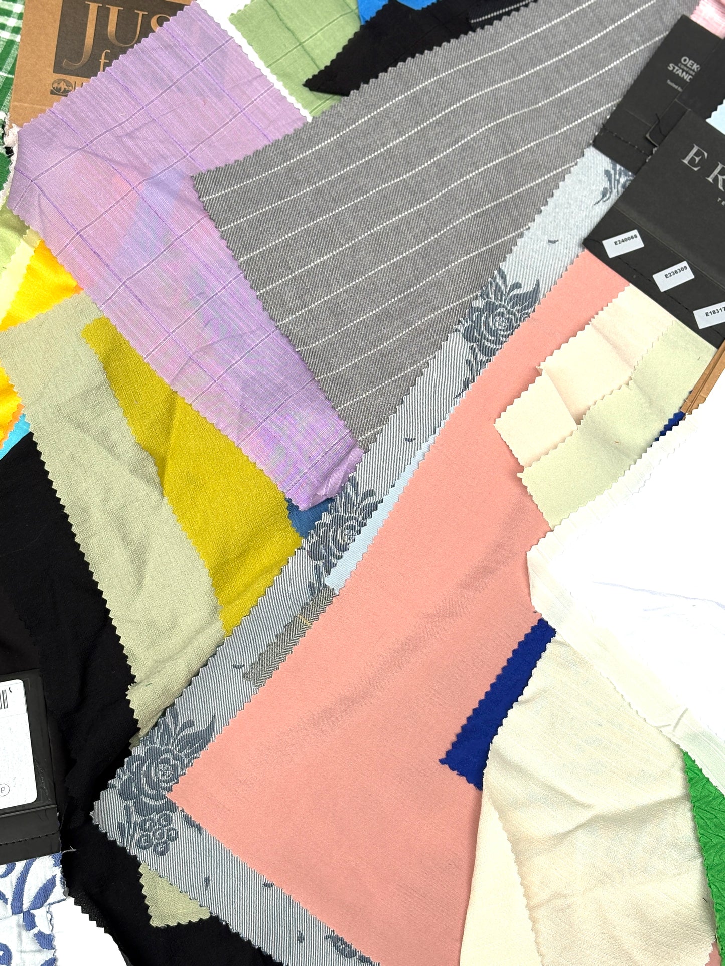 Collection of patterned fabric samples in various colours