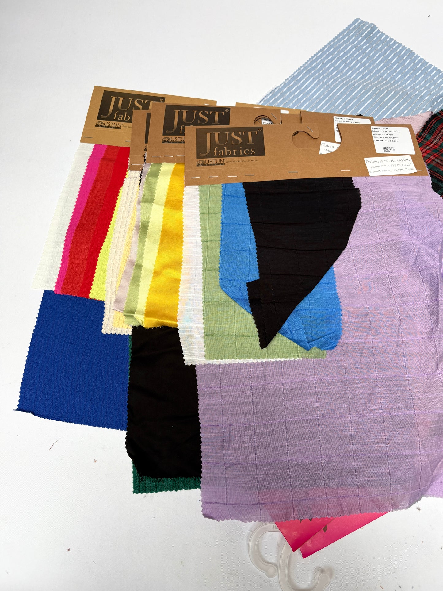 Collection of patterned fabric samples in various colours