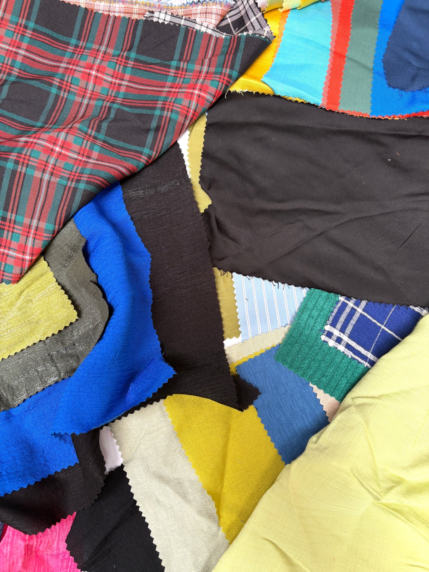 Collection of patterned fabric samples in various colours