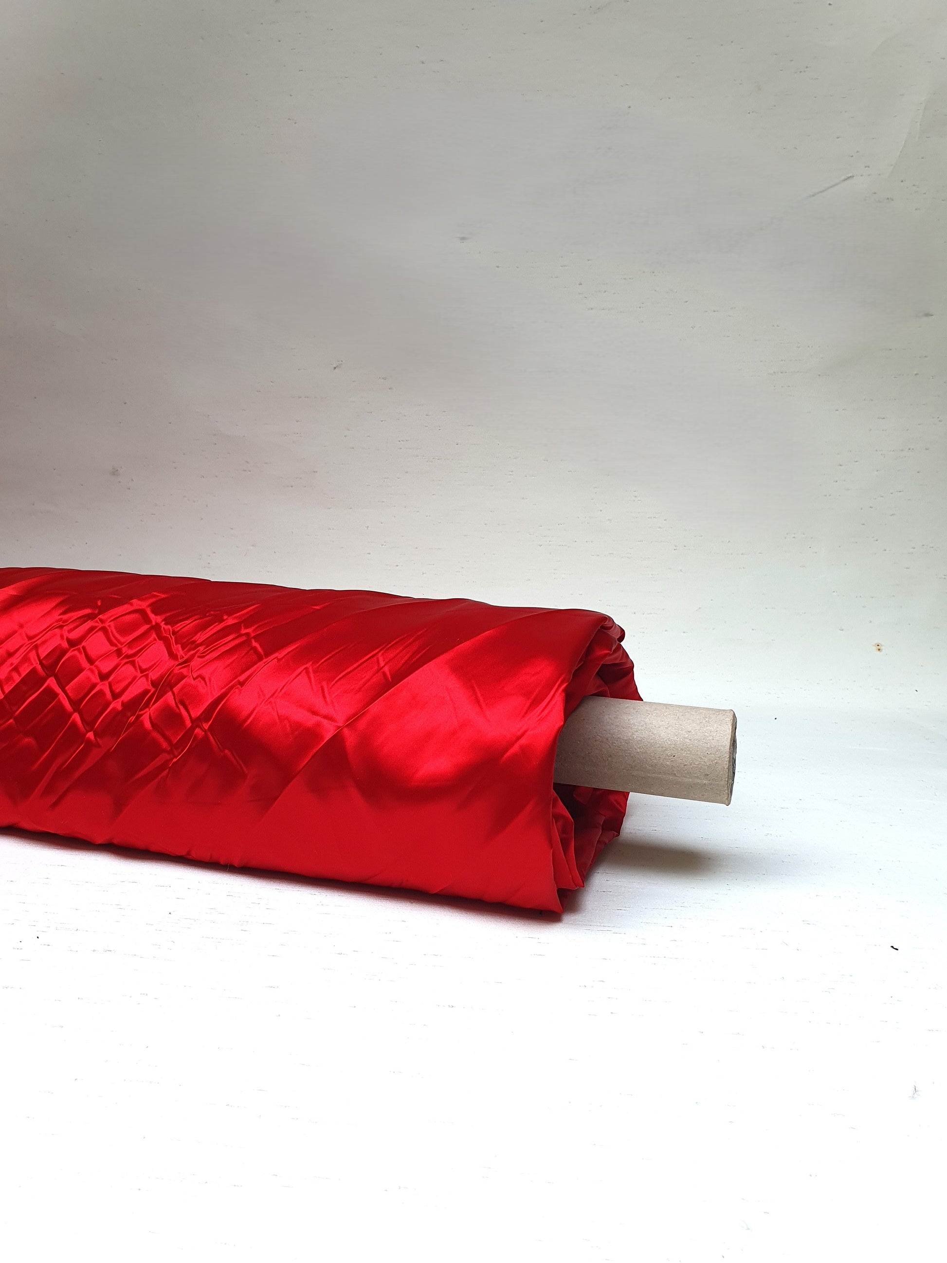 Satin rolled fabric in passion red 