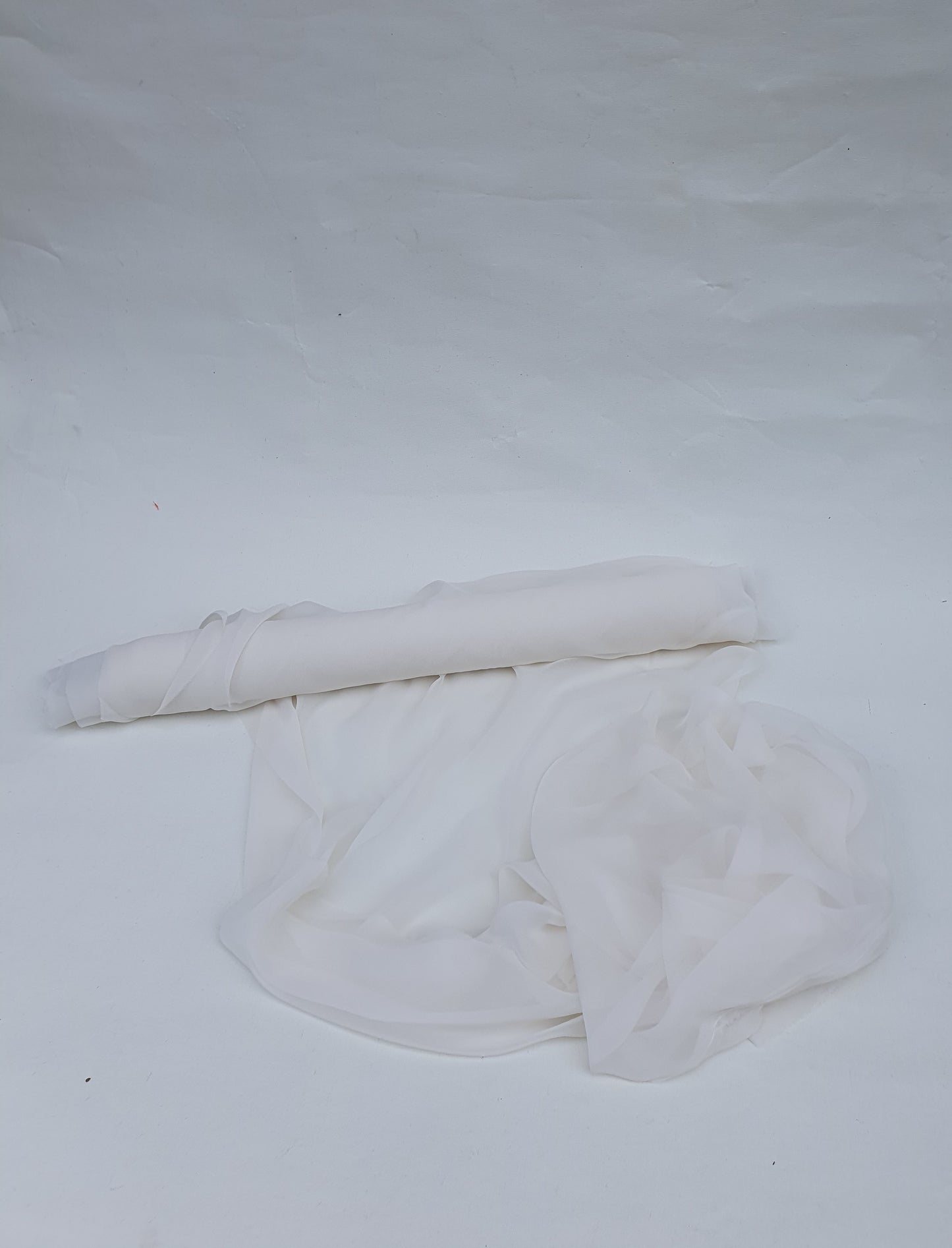 Translucent white silk organza fabric
