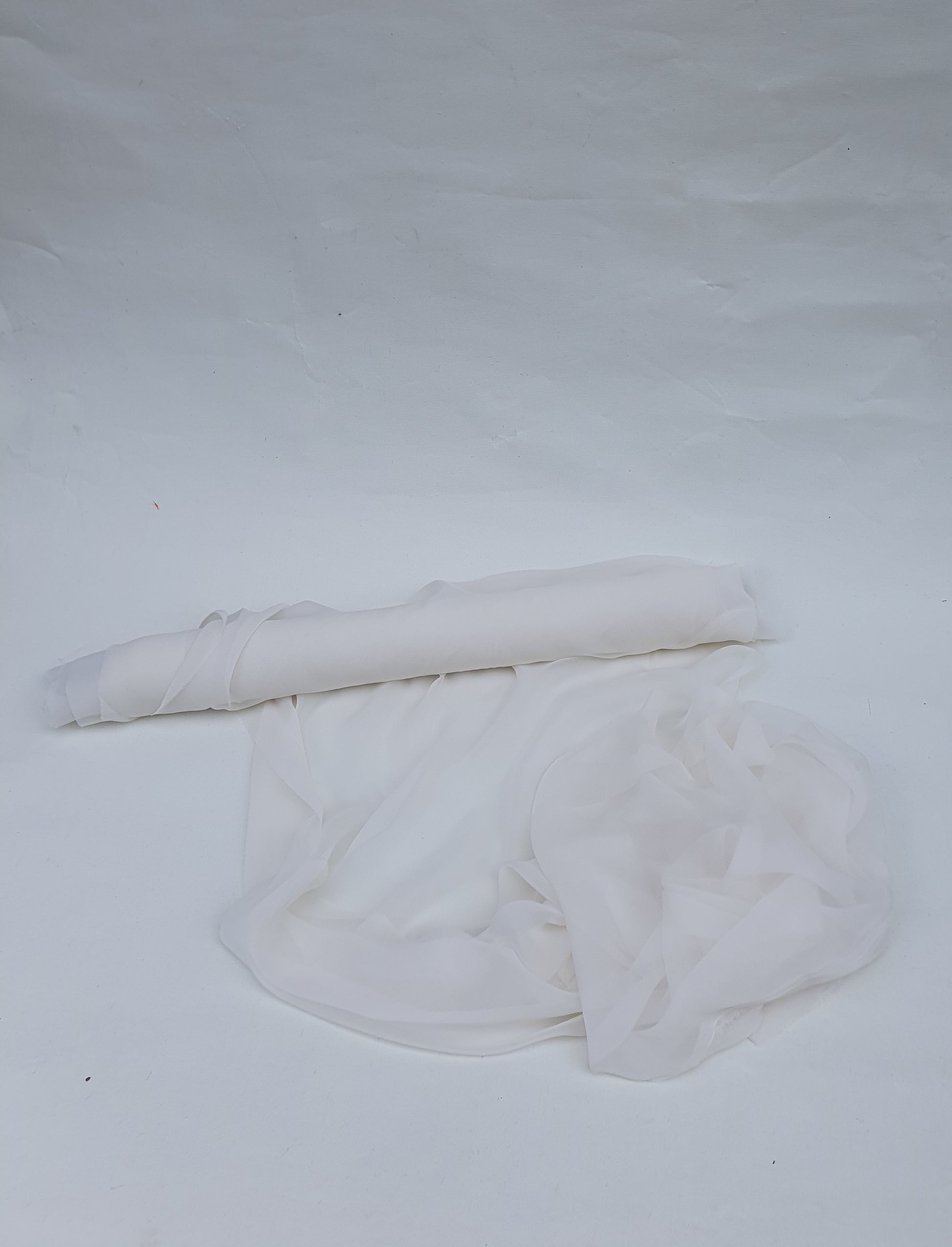 Translucent white silk organza fabric