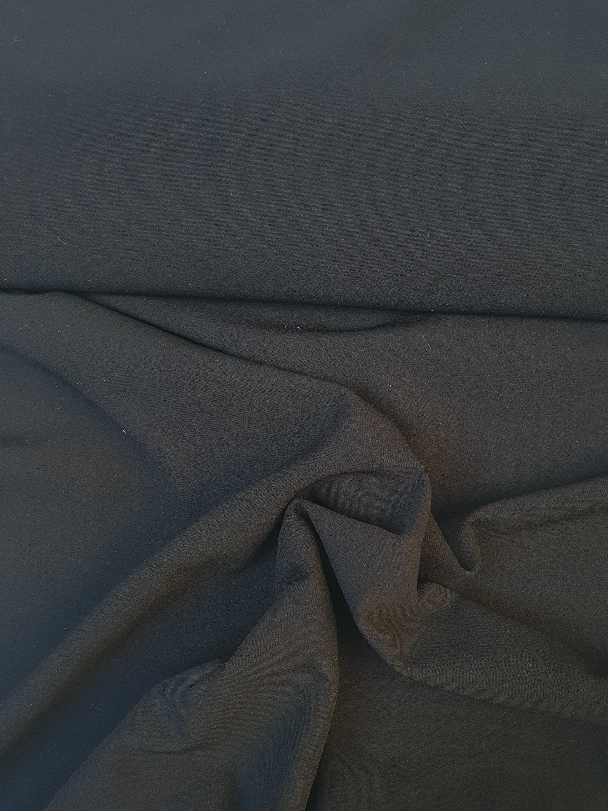 Stretch crepe fabric in black 
