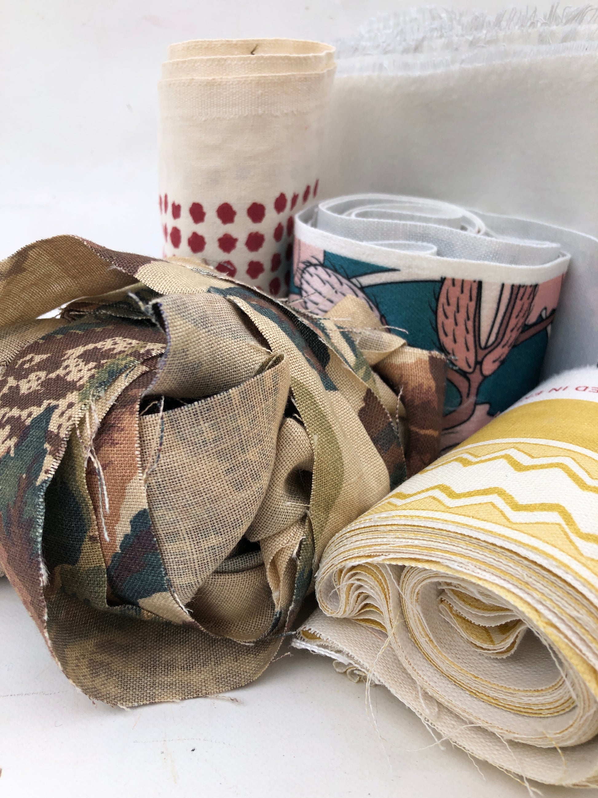 Bundles of fabric stripes with various patterns