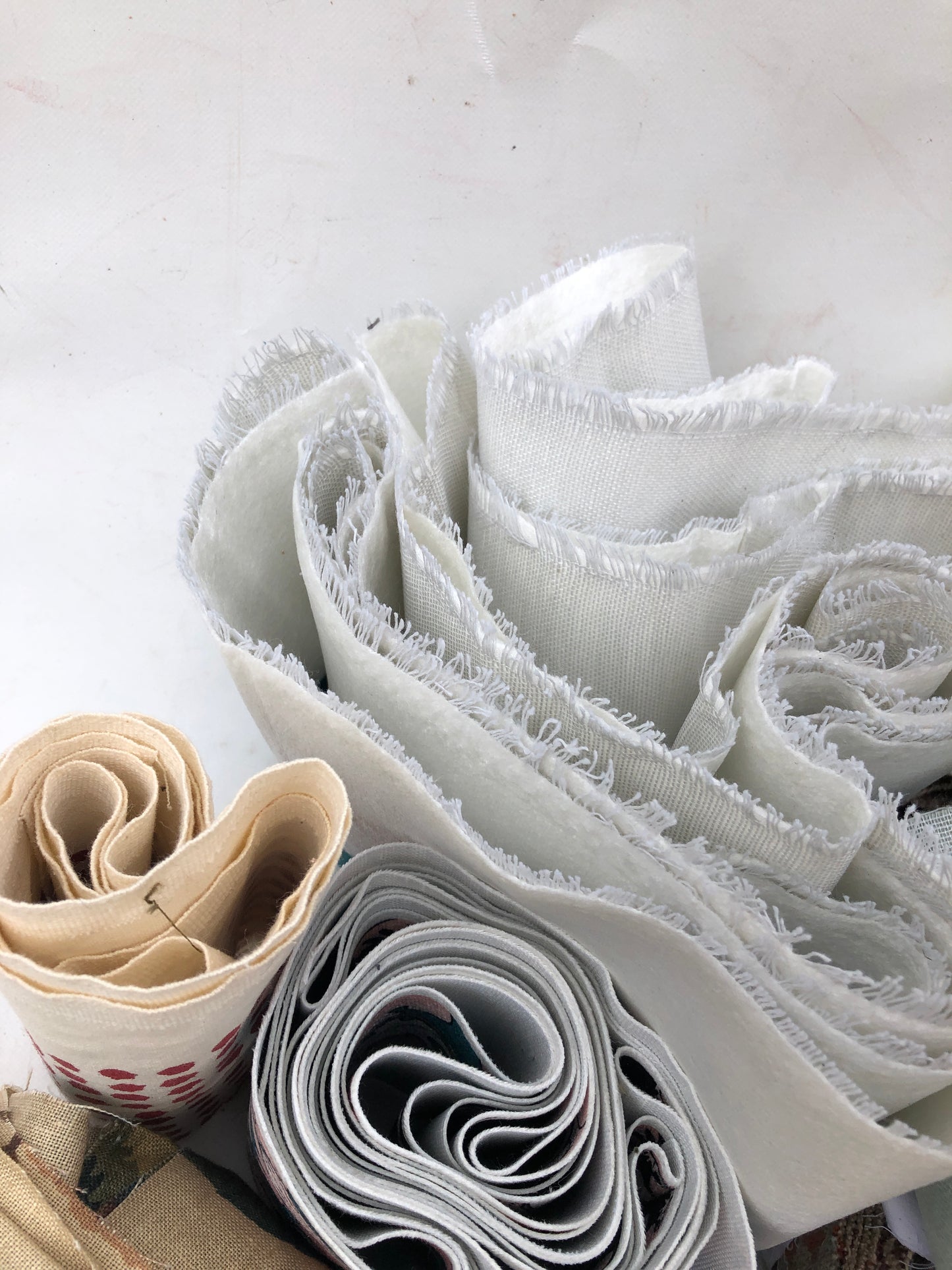 Bundles of fabric stripes with various patterns