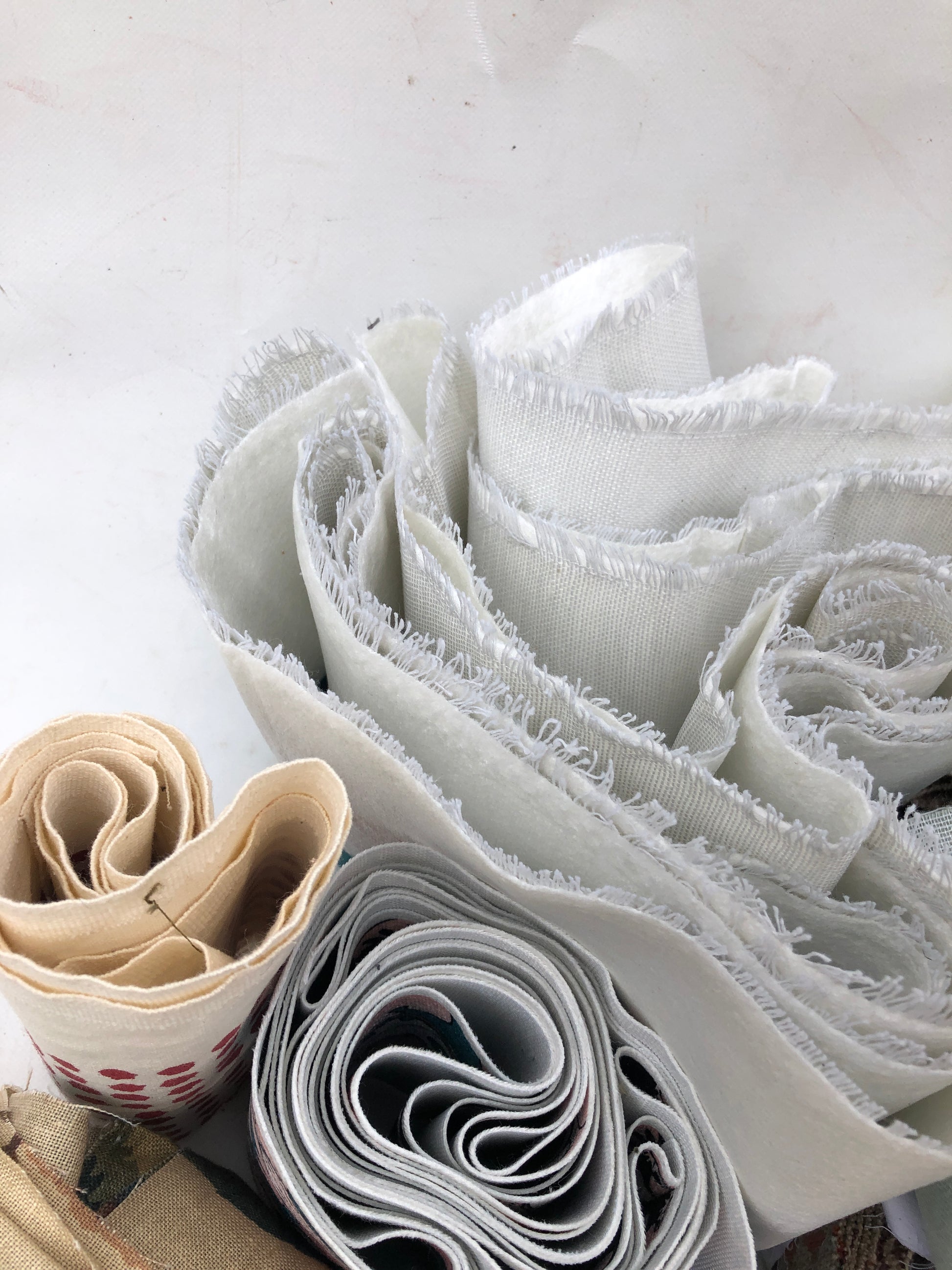 Bundles of fabric stripes with various patterns