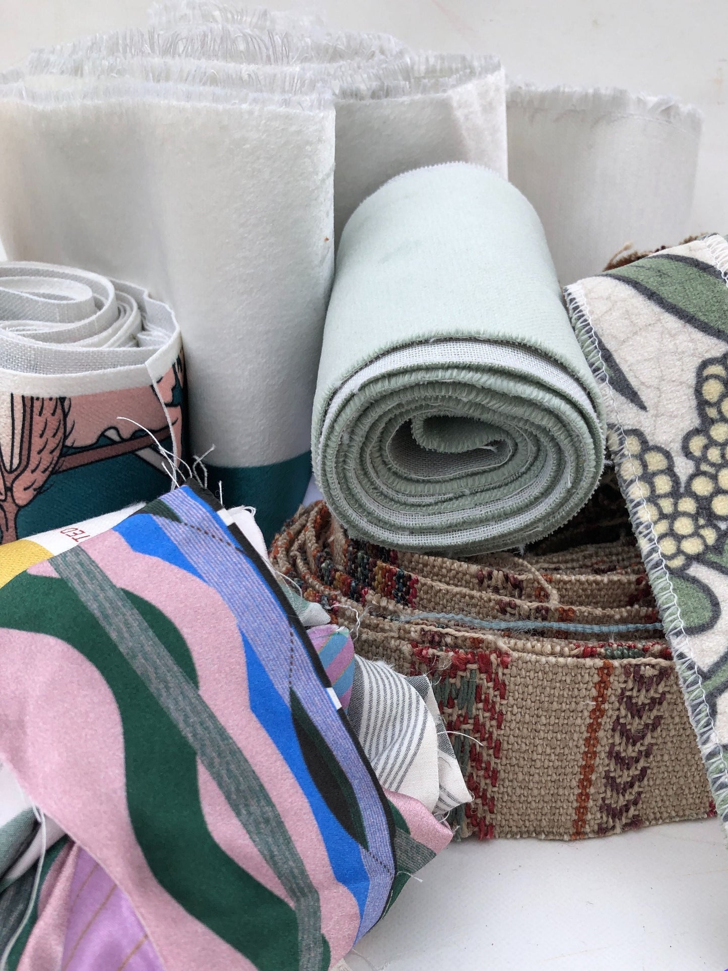 Bundles of fabric stripes with various patterns