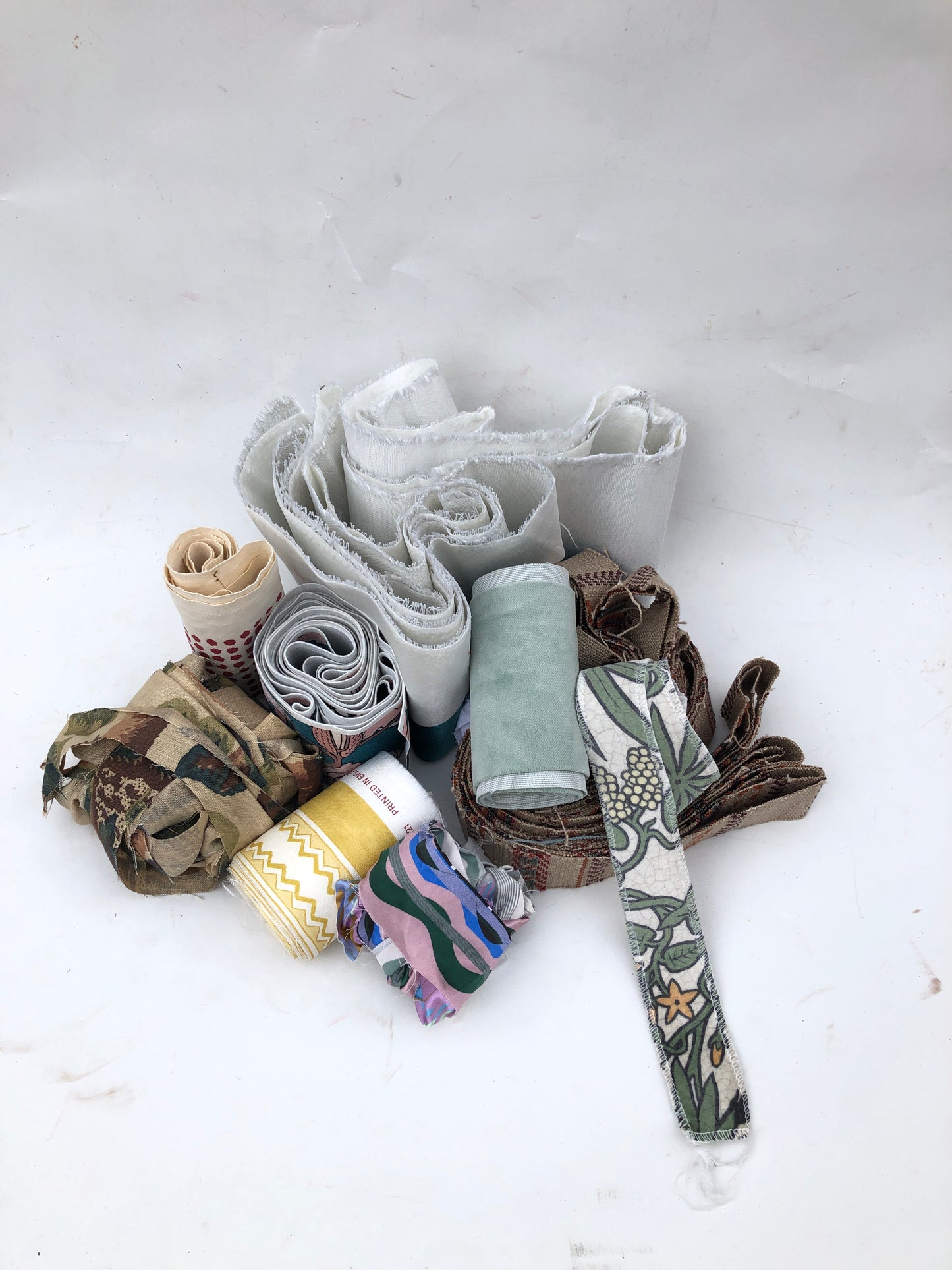 Bundles of fabric stripes with various patterns