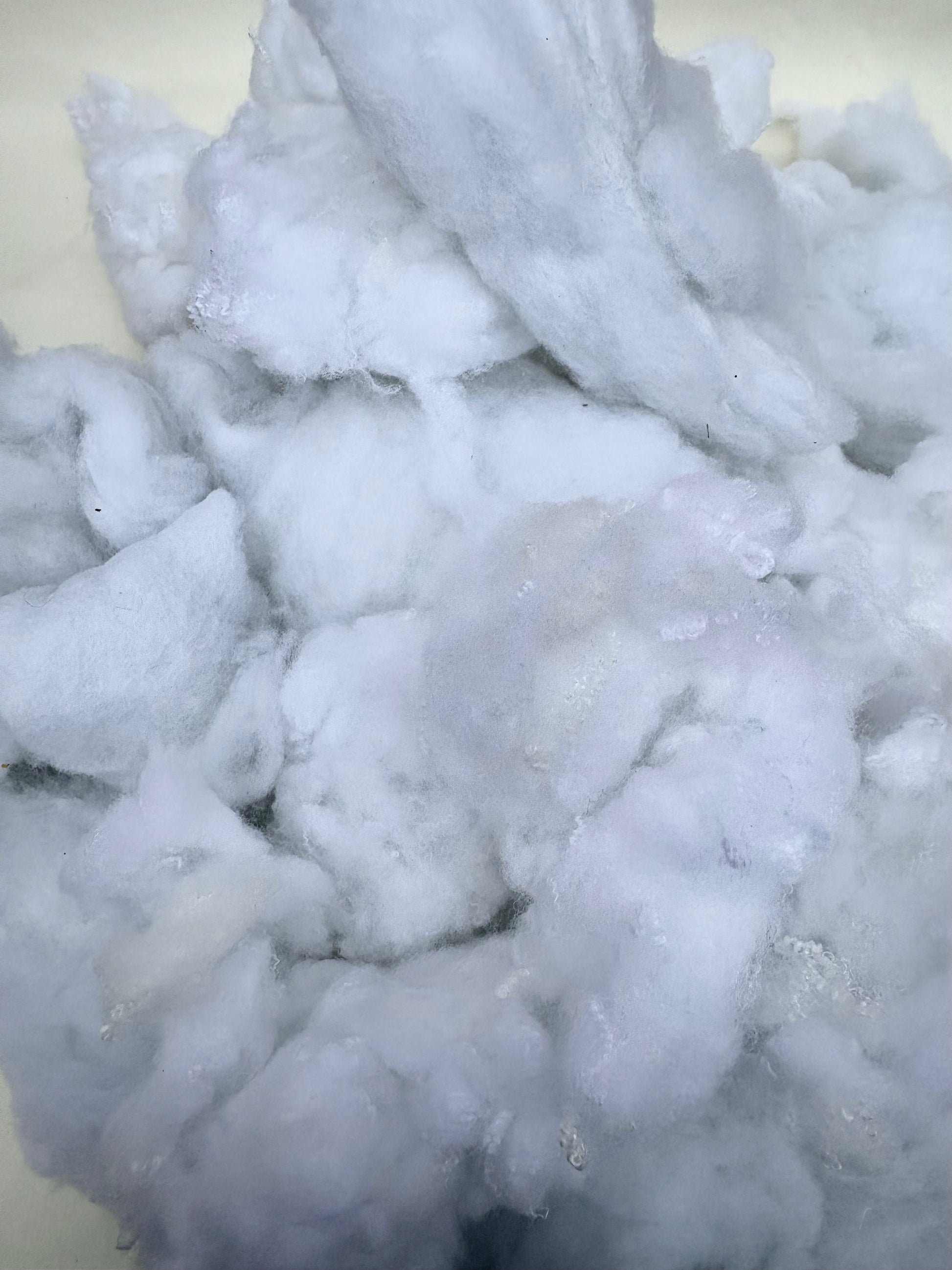 Close-up of soft white stuffing filling