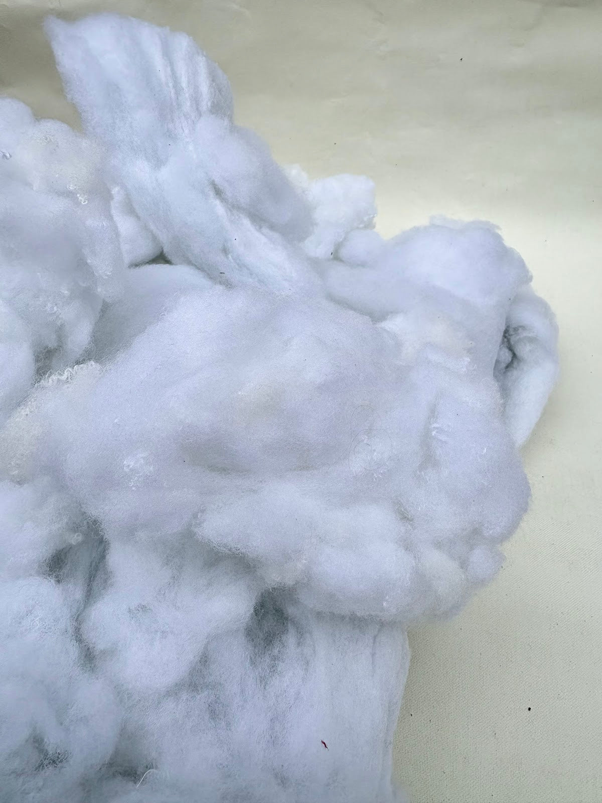 Close-up of soft white stuffing filling