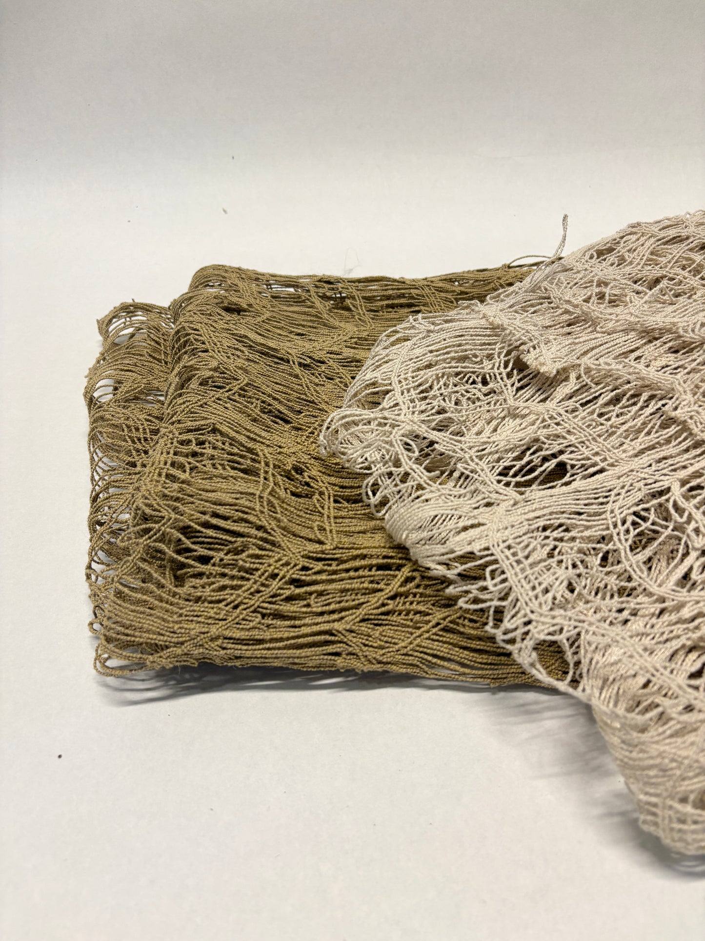 Close-up of jute sheer fabric in beige and brown 