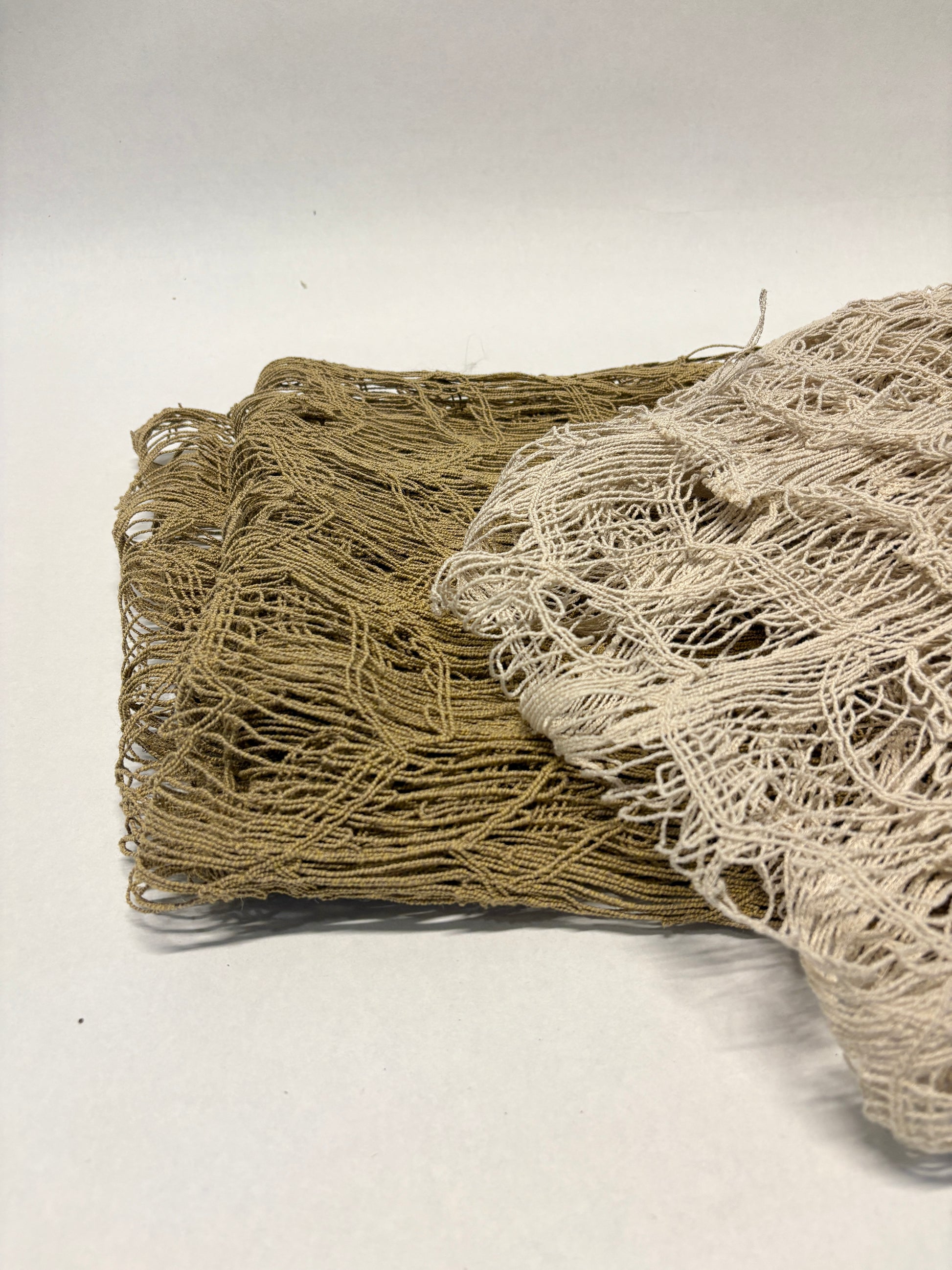 Close-up of jute sheer fabric in beige and brown 