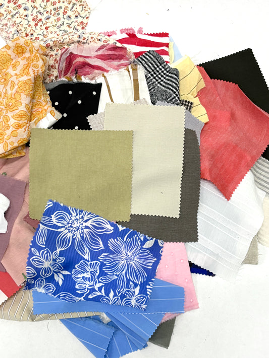 Stack of colourful patterned light-weighted fabric swatches