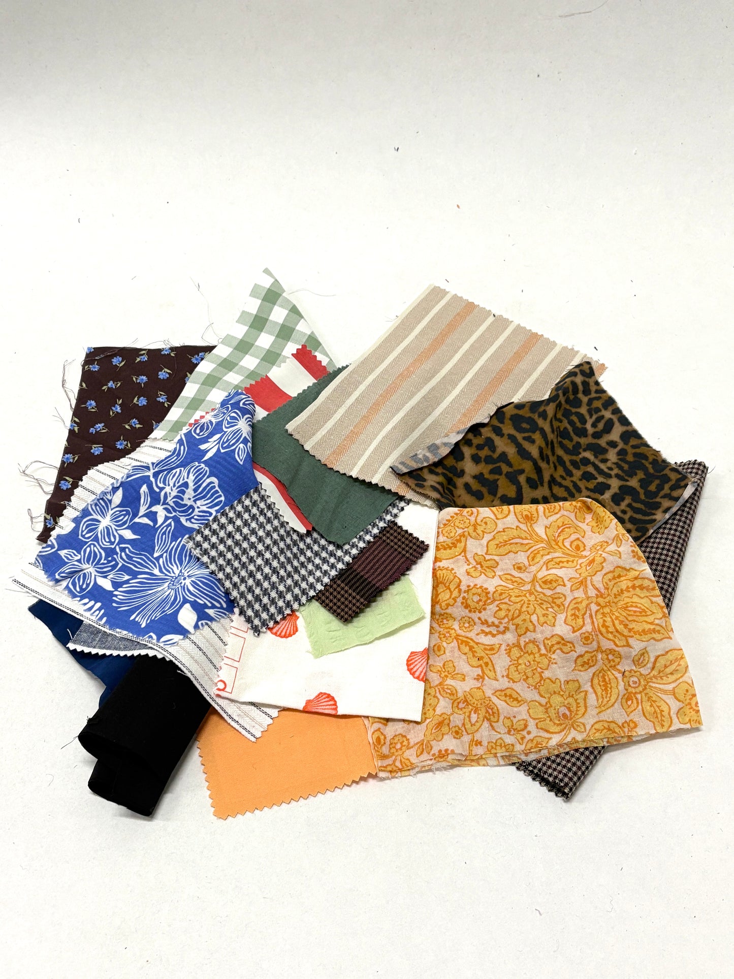 Stack of colourful patterned light-weighted fabric swatches