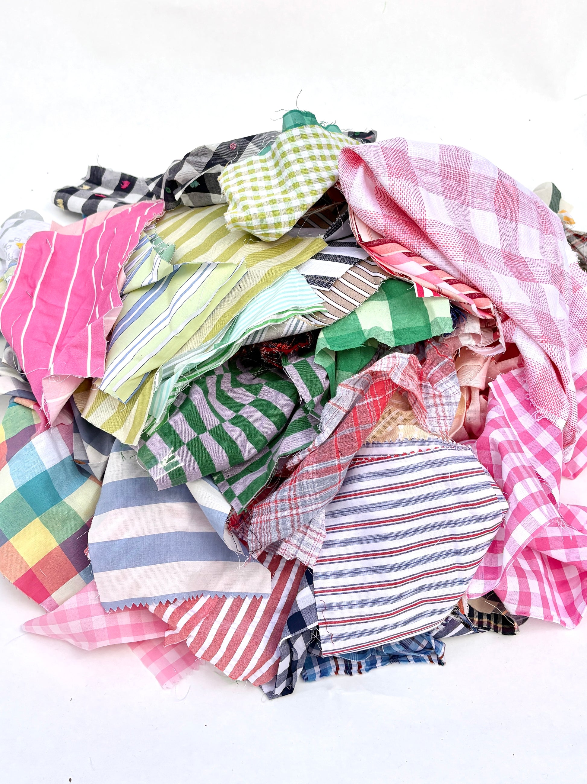 Stack of colourful patterned light-weighted fabric swatches