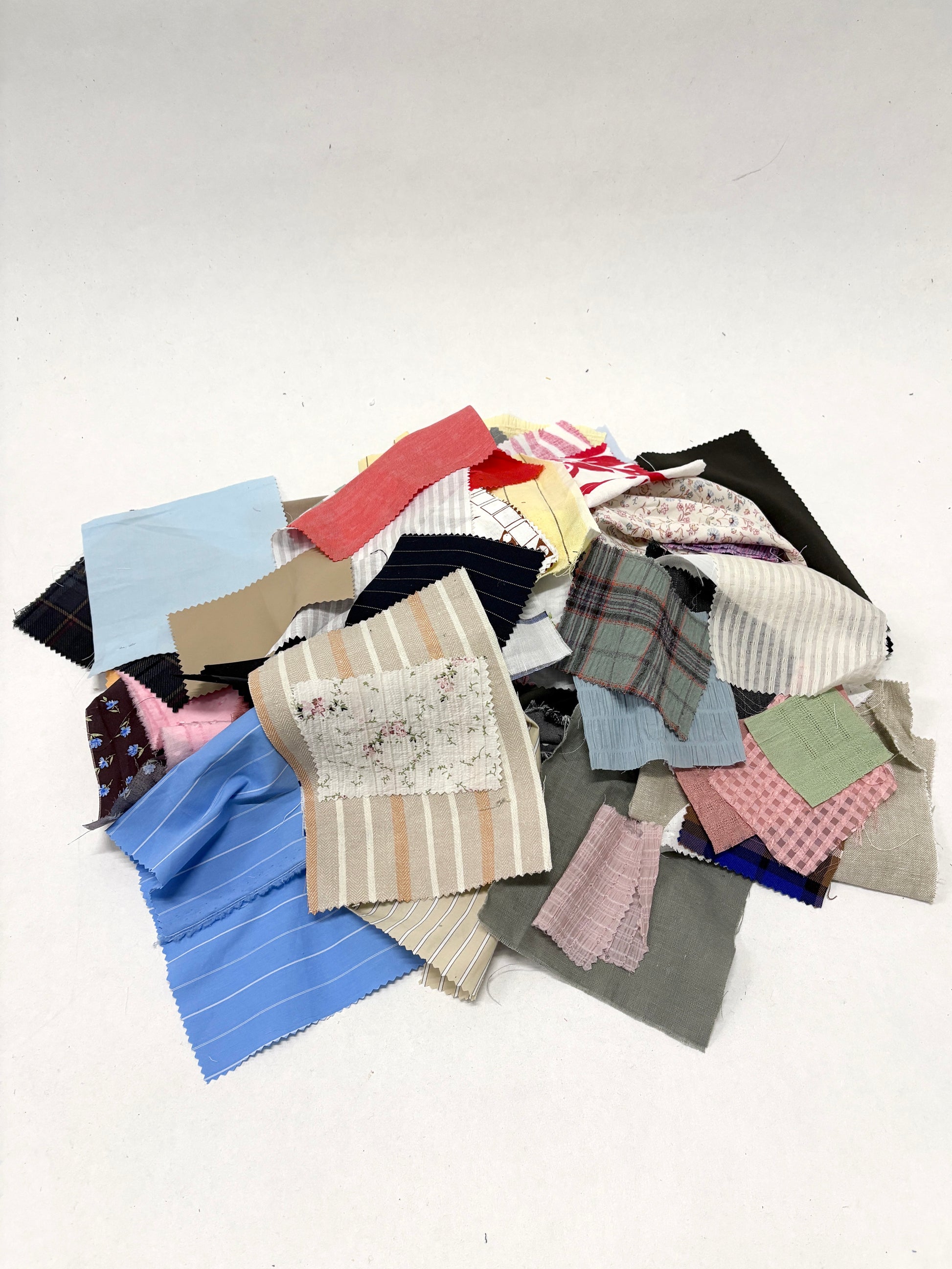 Stack of colourful patterned light-weighted fabric swatches