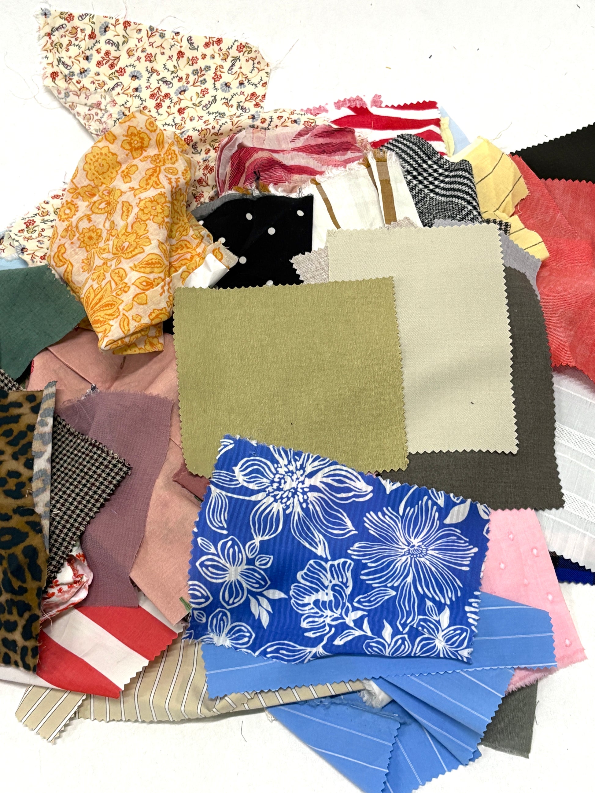 Stack of colourful patterned light-weighted fabric swatches