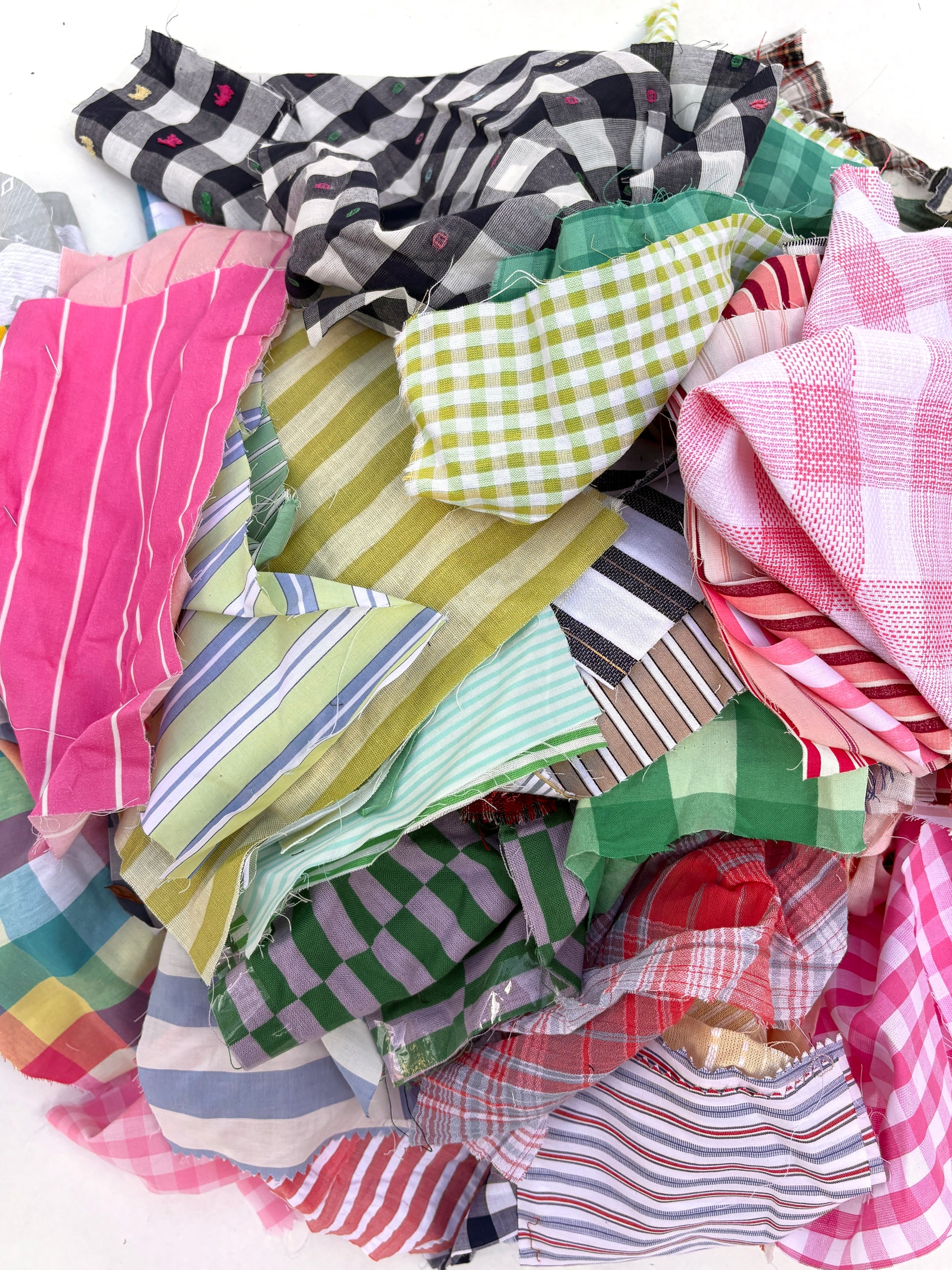 Stack of colourful patterned light-weighted fabric swatches