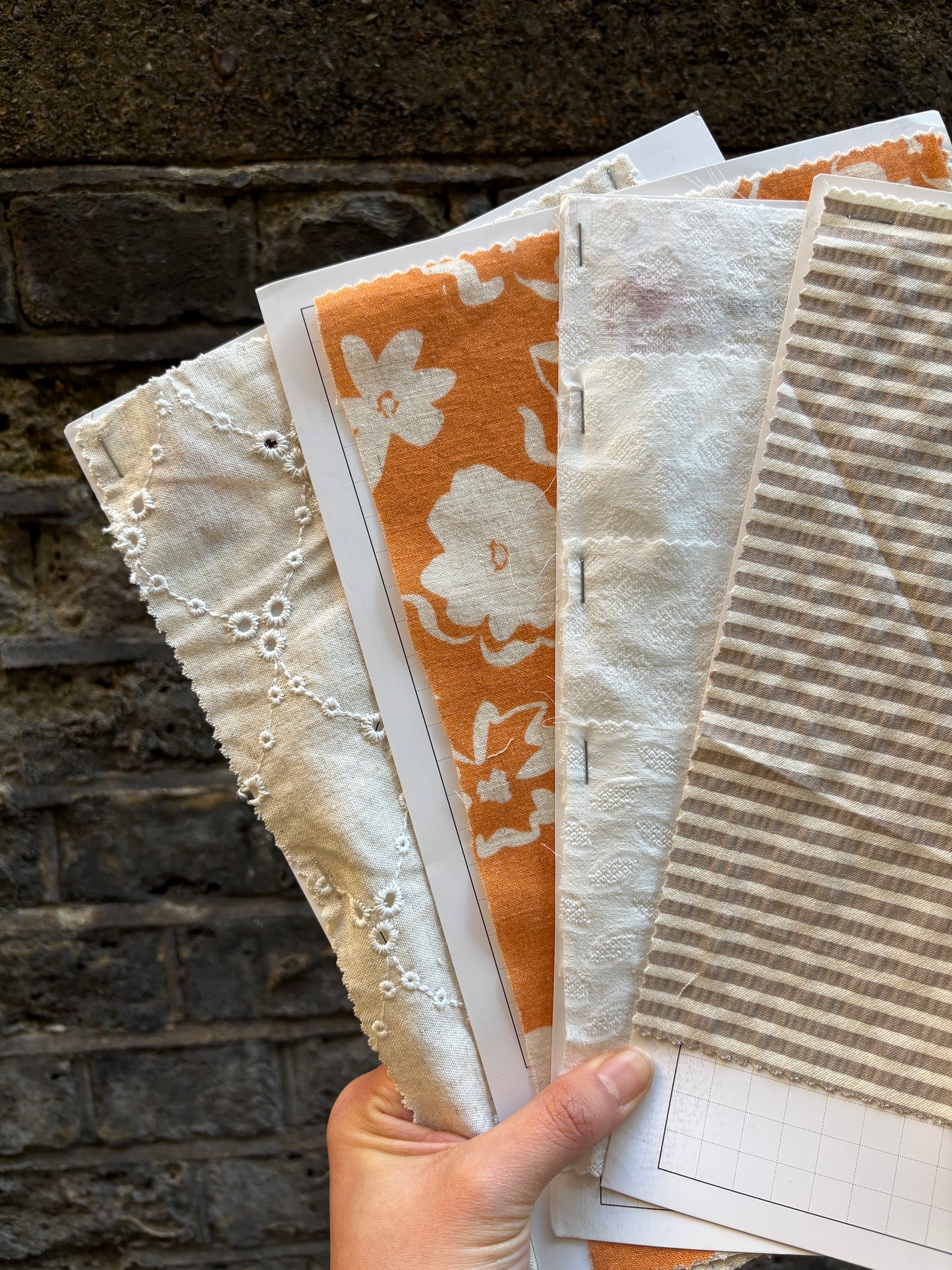Fabric swatches with various patterns and colours
