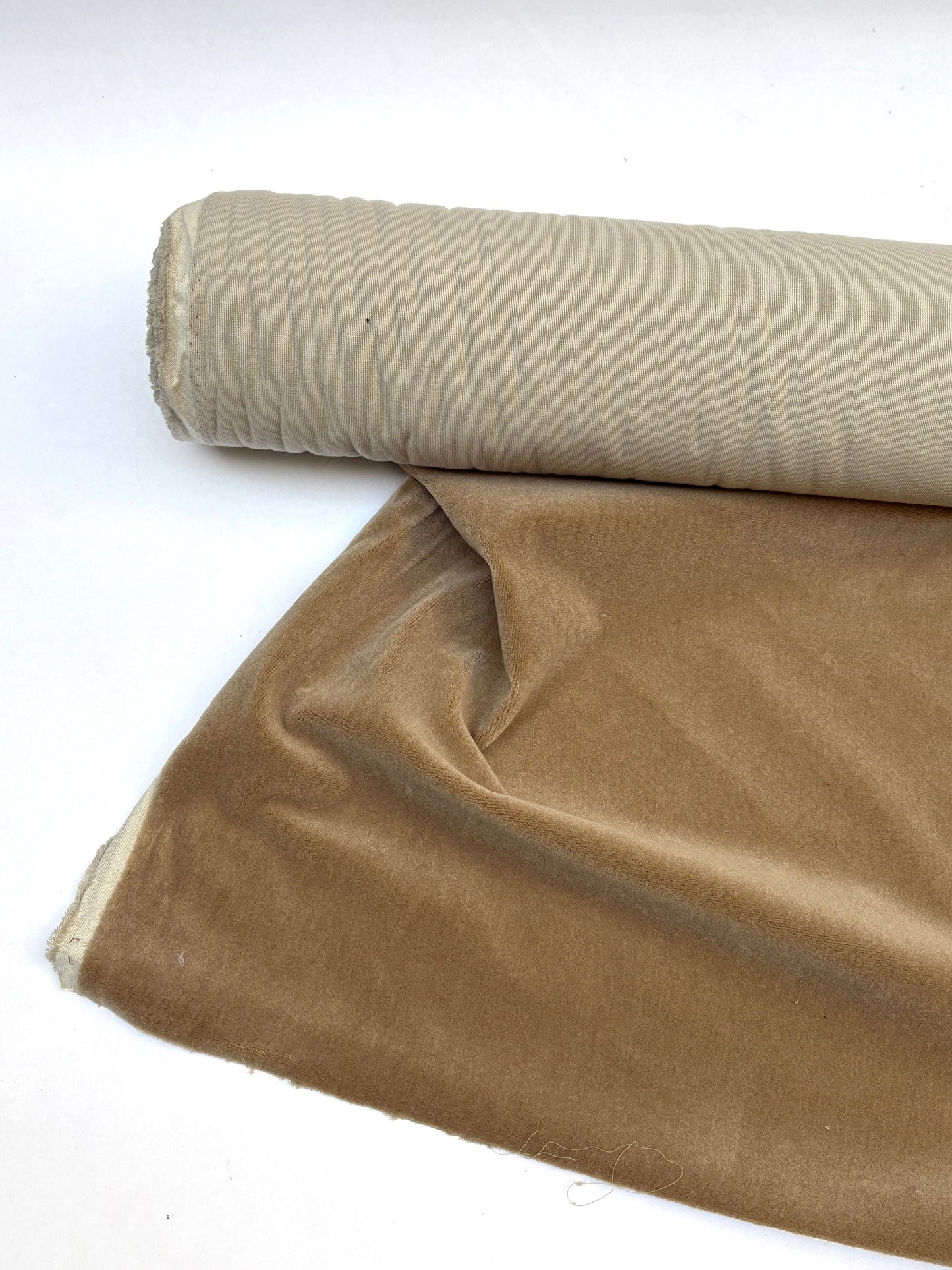 Dark camel velvet fabric roll with soft texture 
