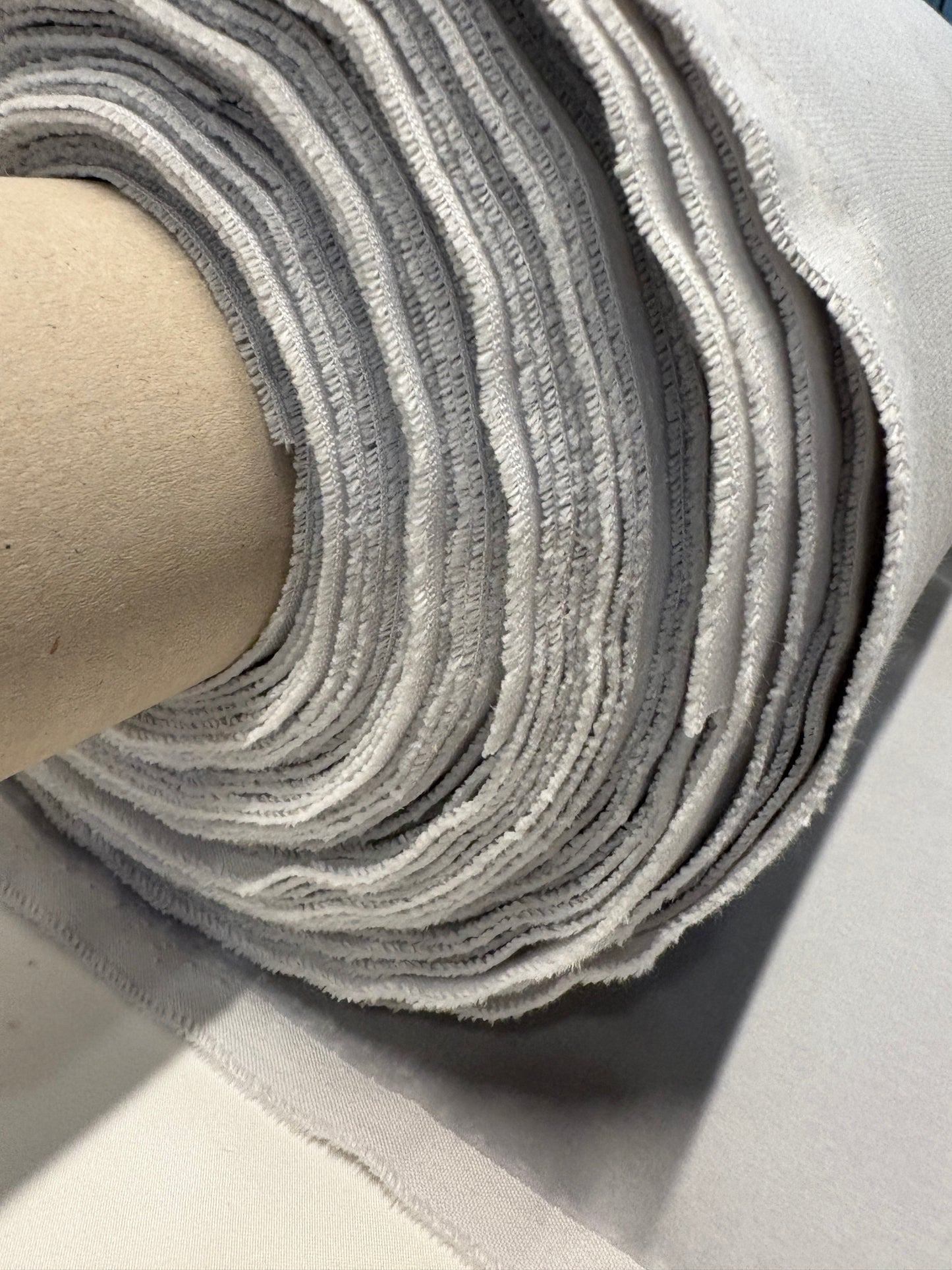Rolled silver grey velvet fabric 