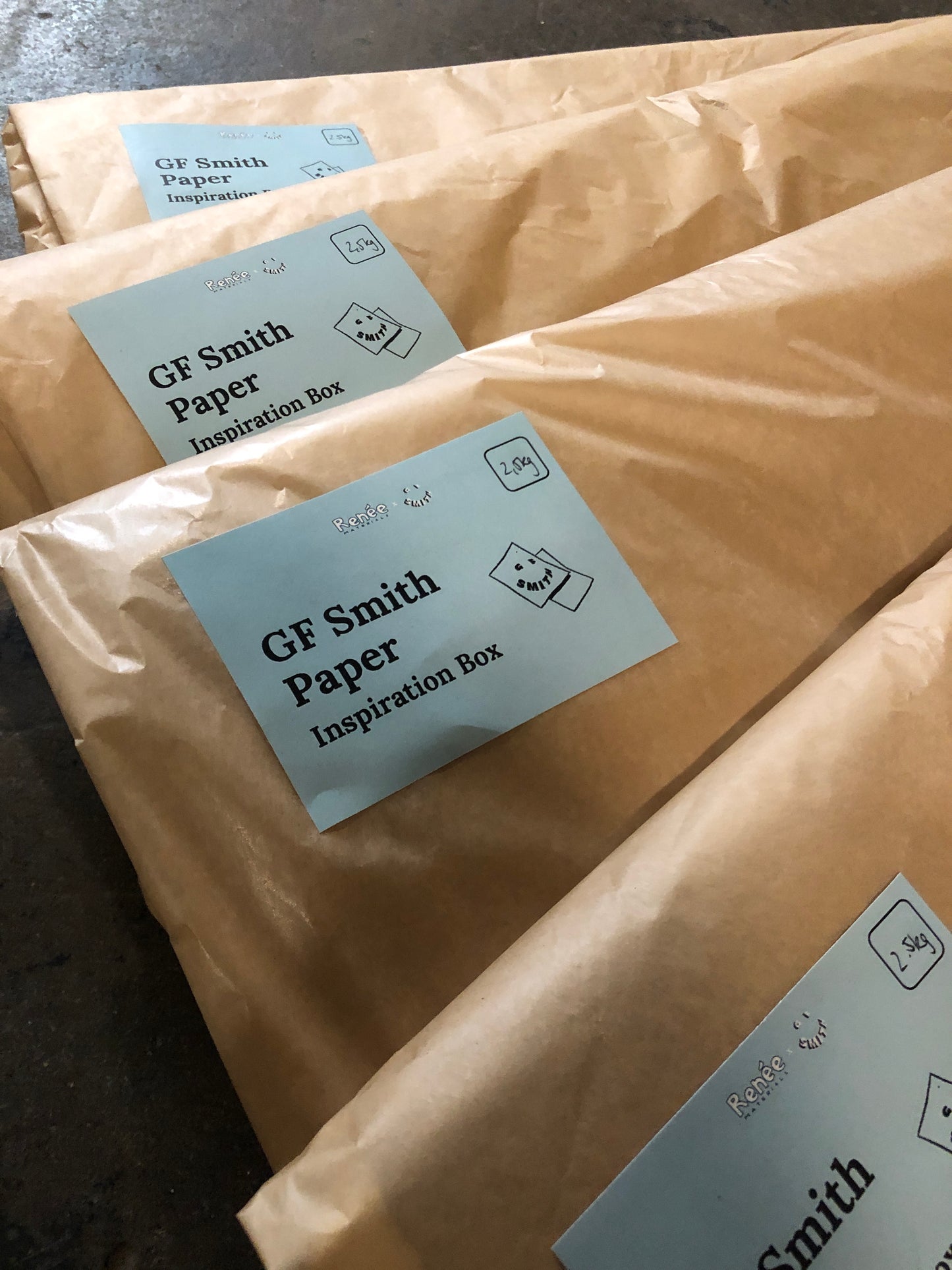 Brown paper bags with GF Smith paper inspiration labels