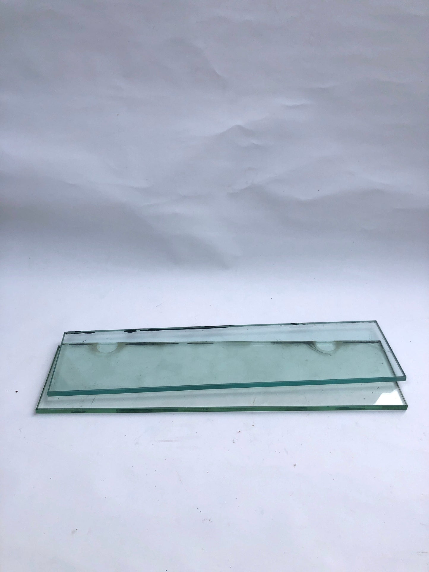 Two transparent glass plates, and something stained on them