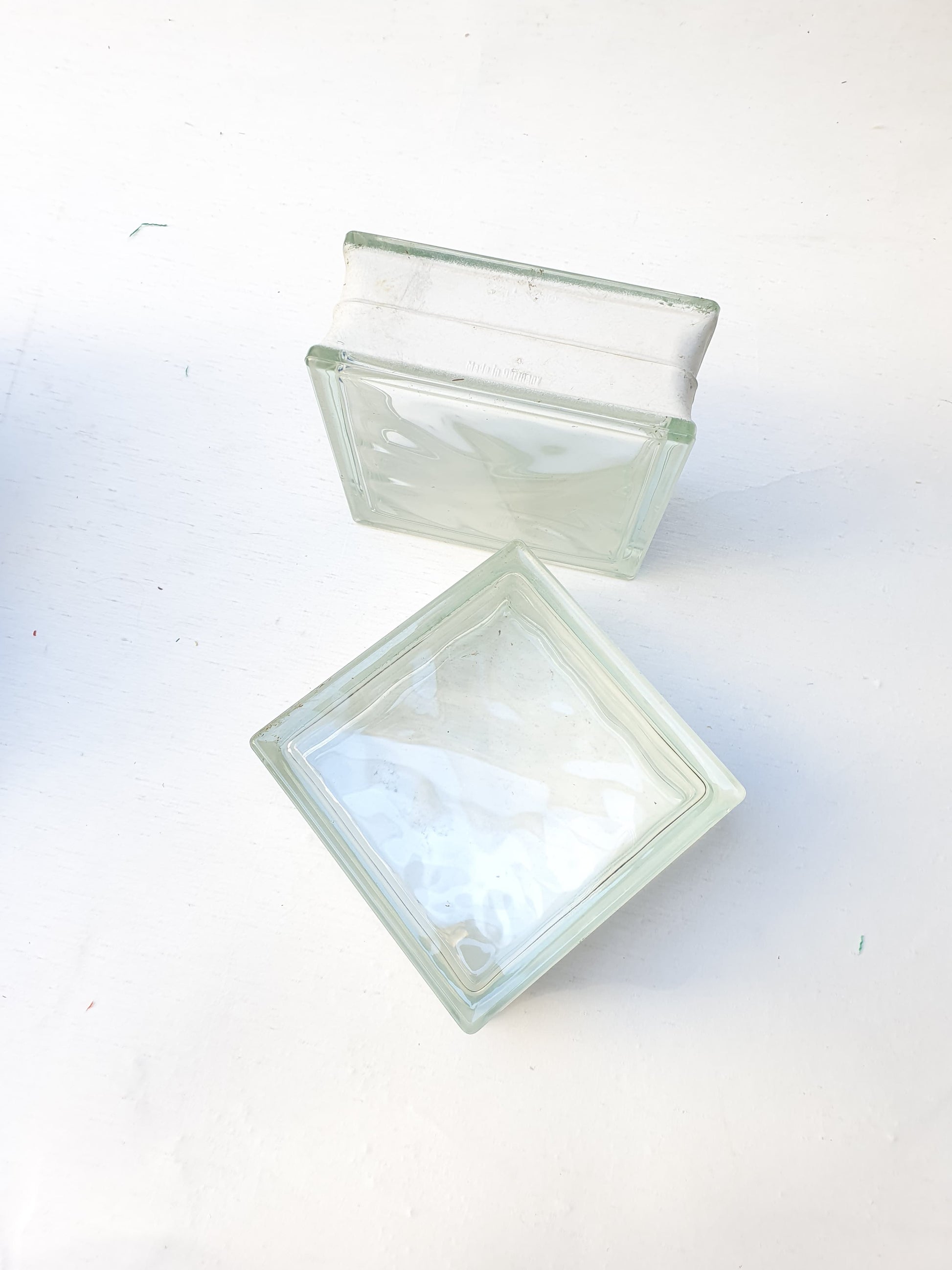 Two white glass brick blocks