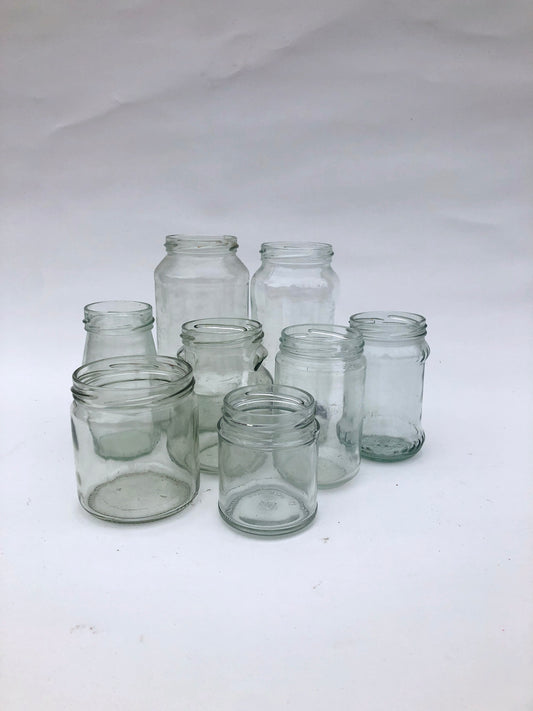Collection of glass jars with various sizes 