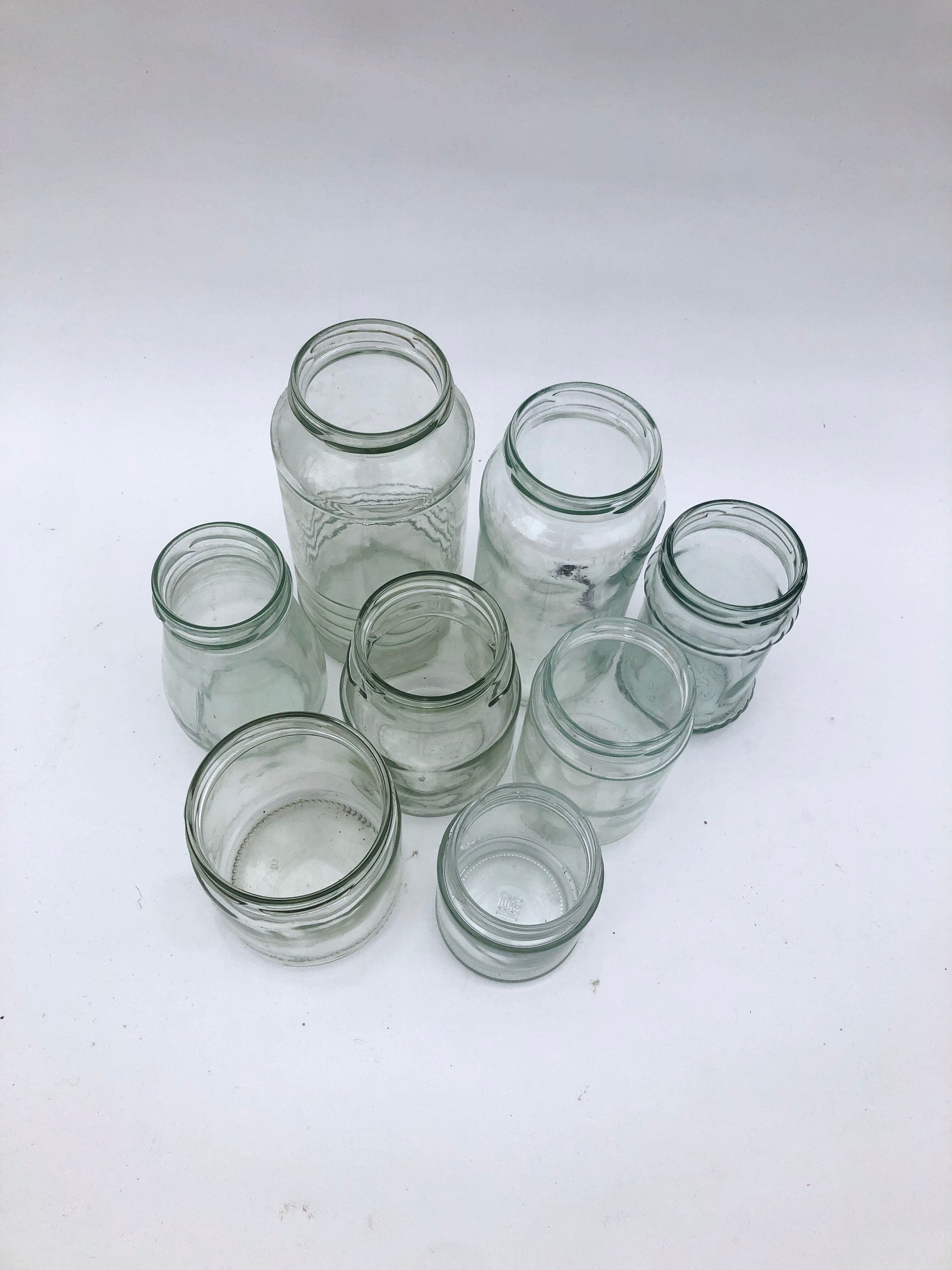 Collection of glass jars with various sizes 