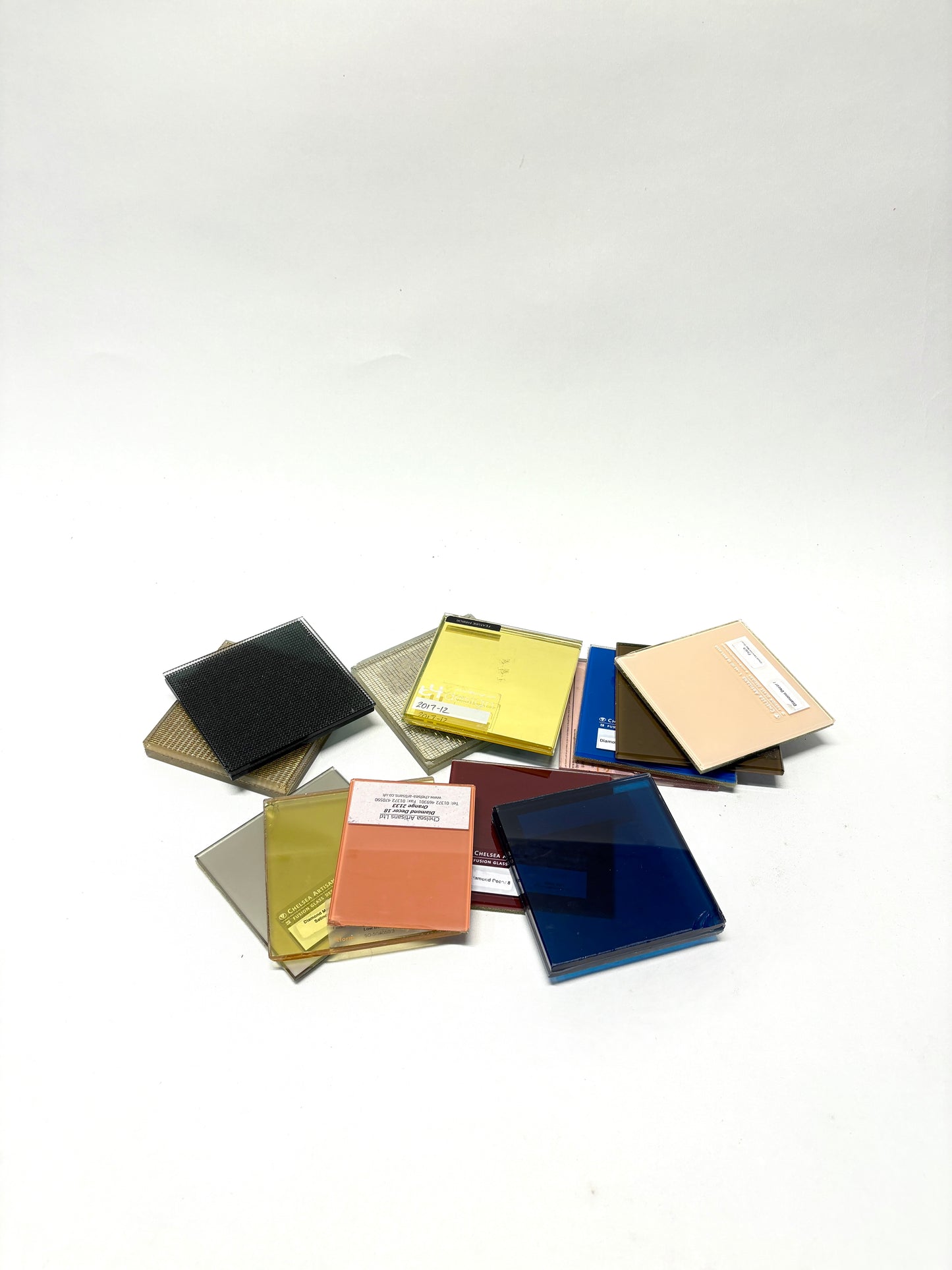 Collection of square colourful glass samples