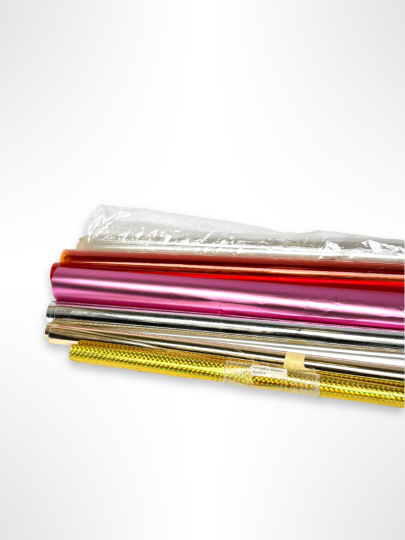 Collection of colourful glossy paper plastic rolls 