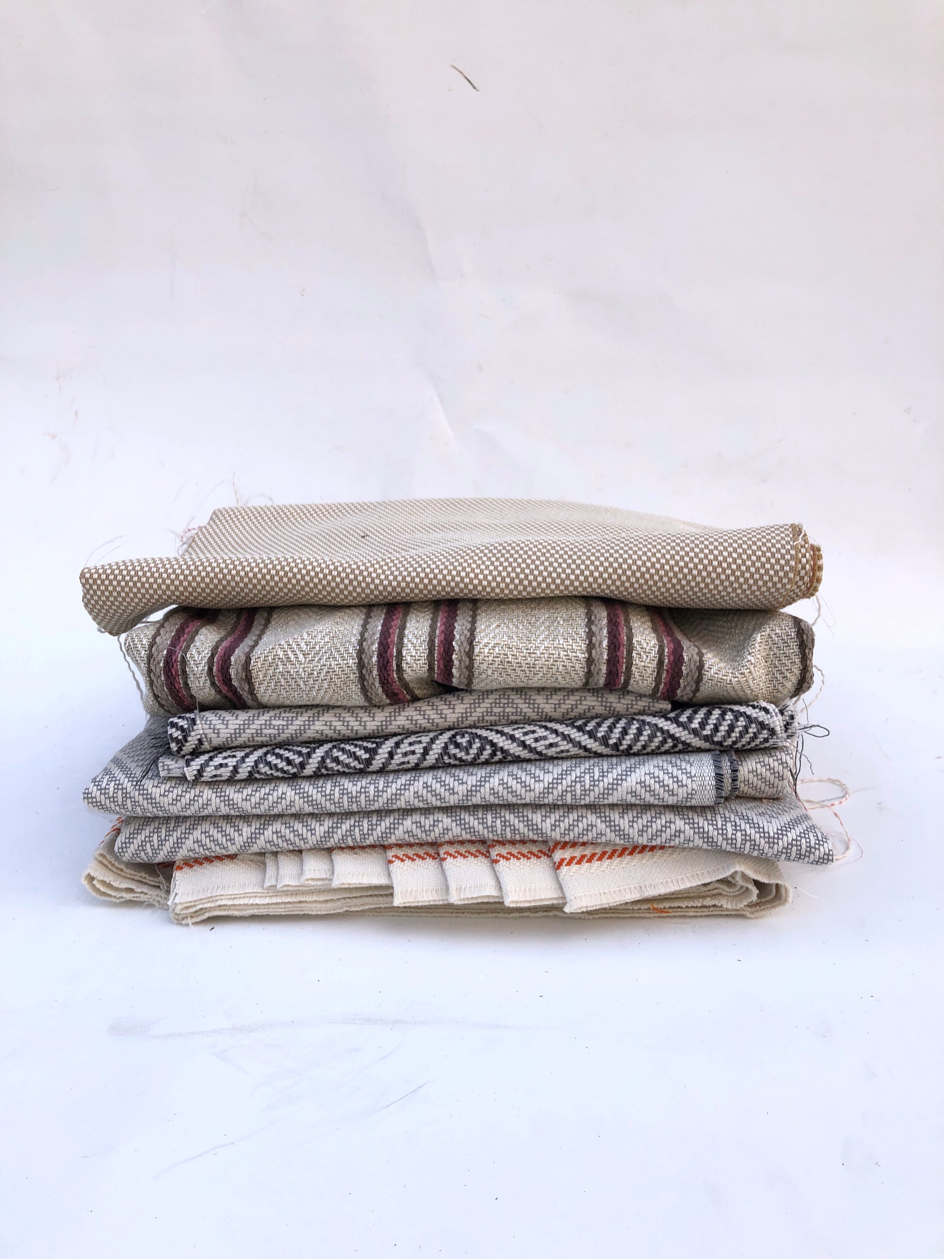 Pile of heavy weight fabric with various patterns