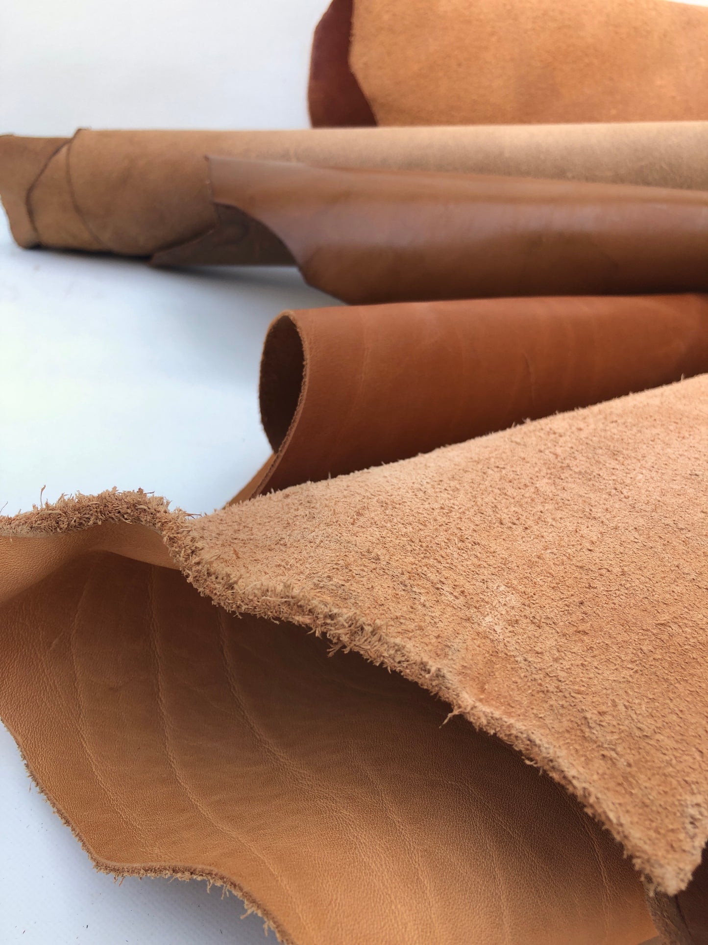 Close-up of brown rolled leather with texture 