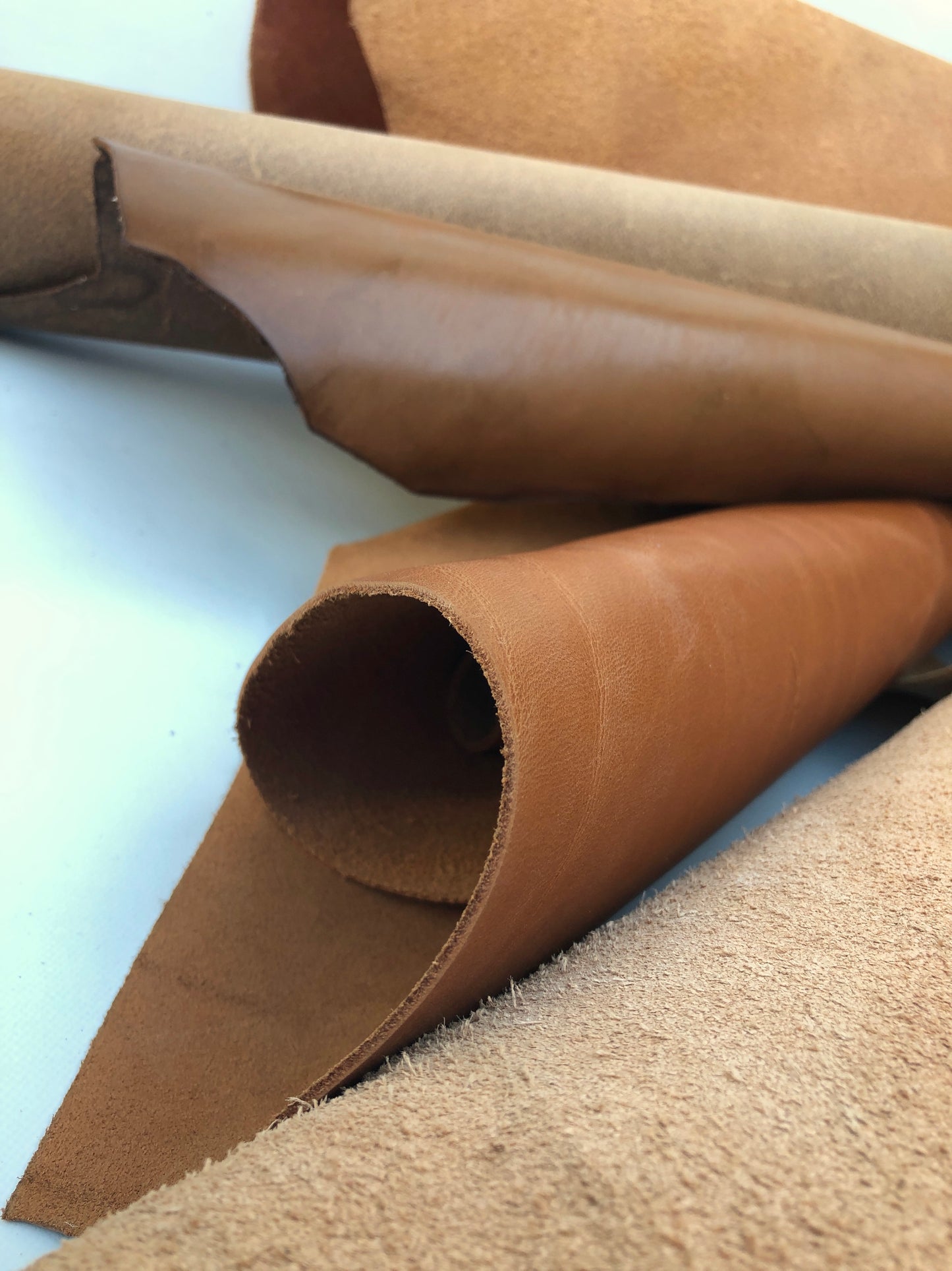 Close-up of brown rolled leather with texture 
