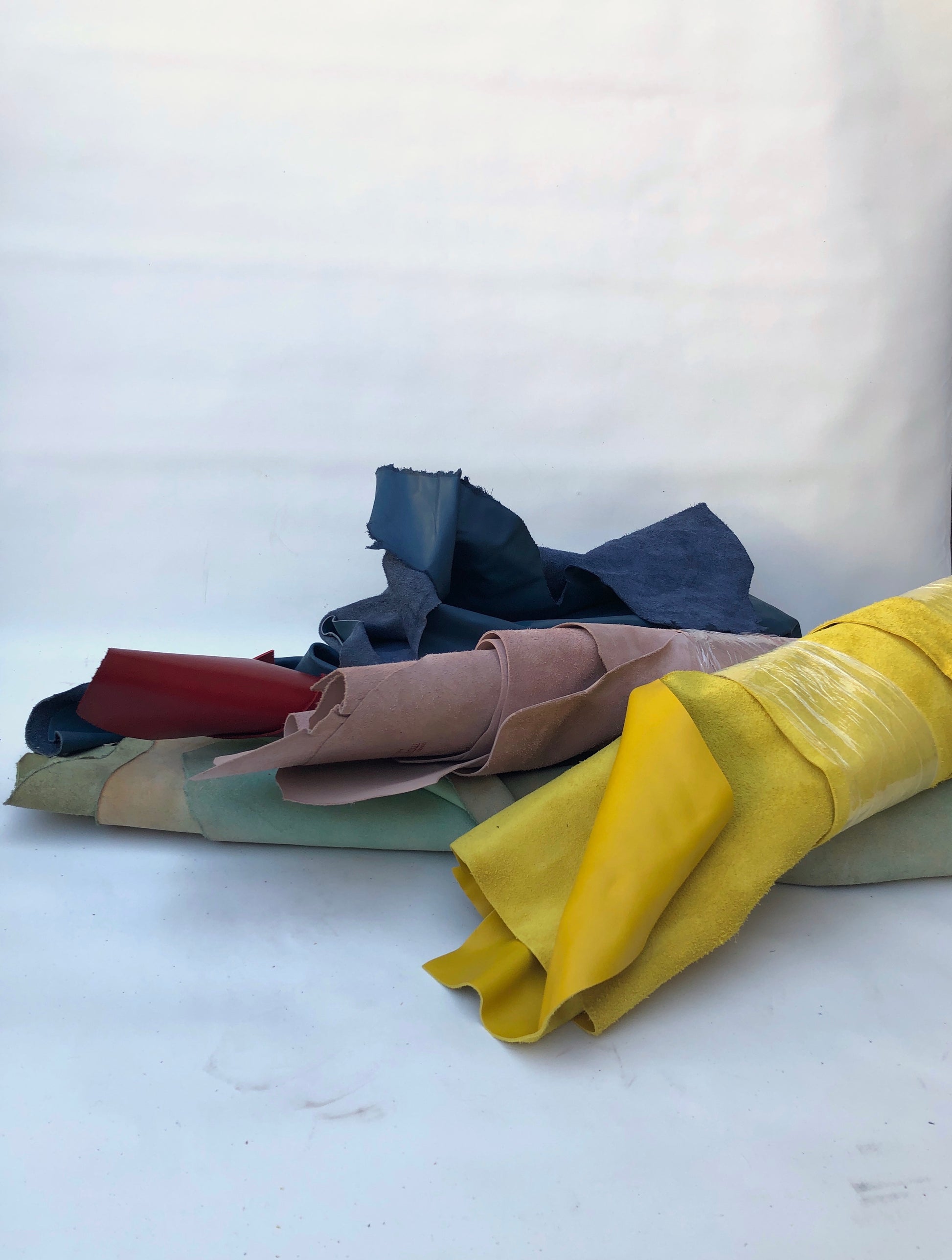Collection of various coloured rolled leather 