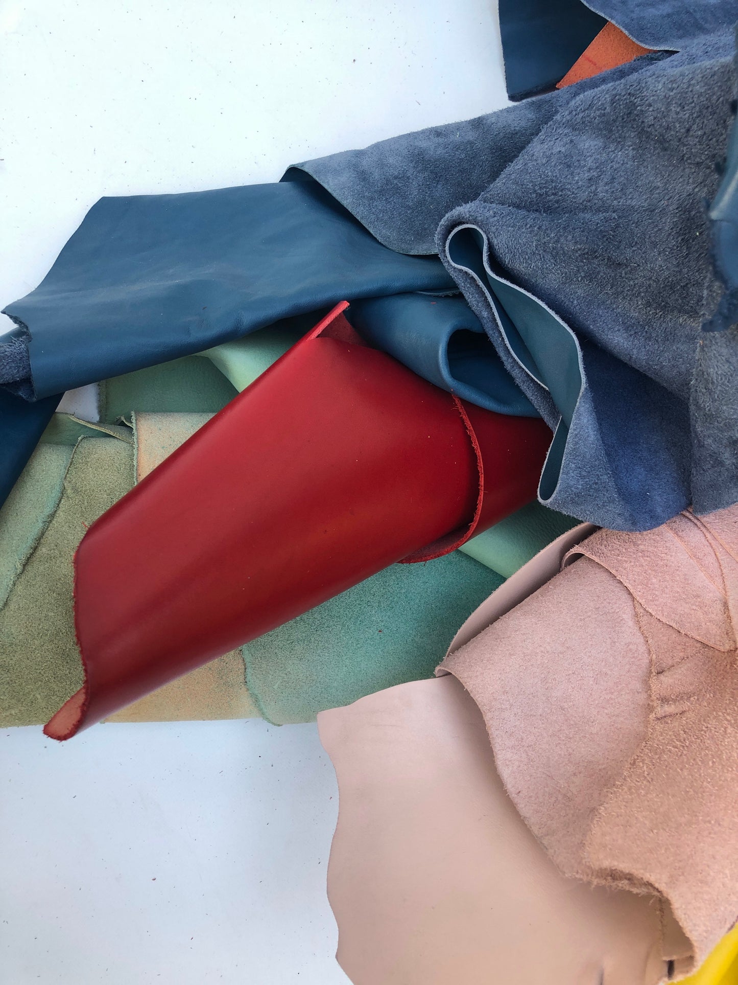 Collection of various coloured rolled leather 
