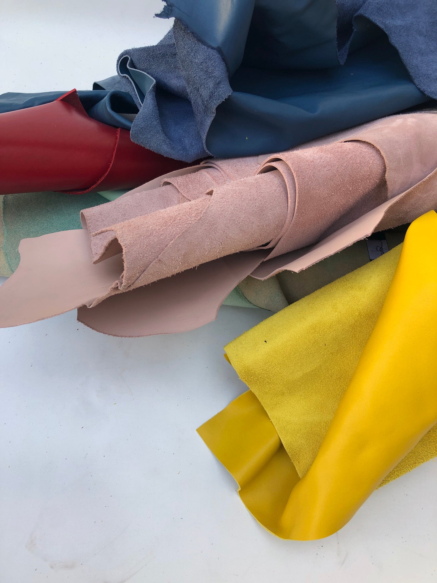 Collection of various coloured rolled leather 
