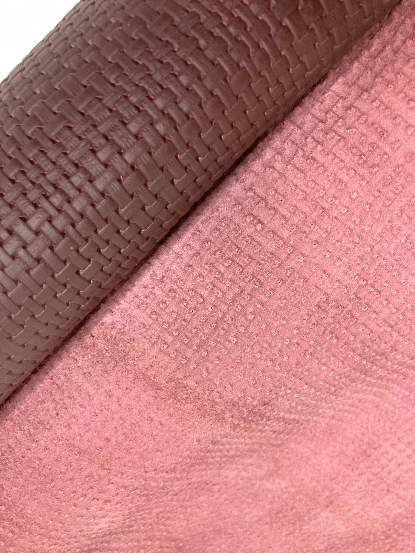 Close-up of rolled-up embossed leather