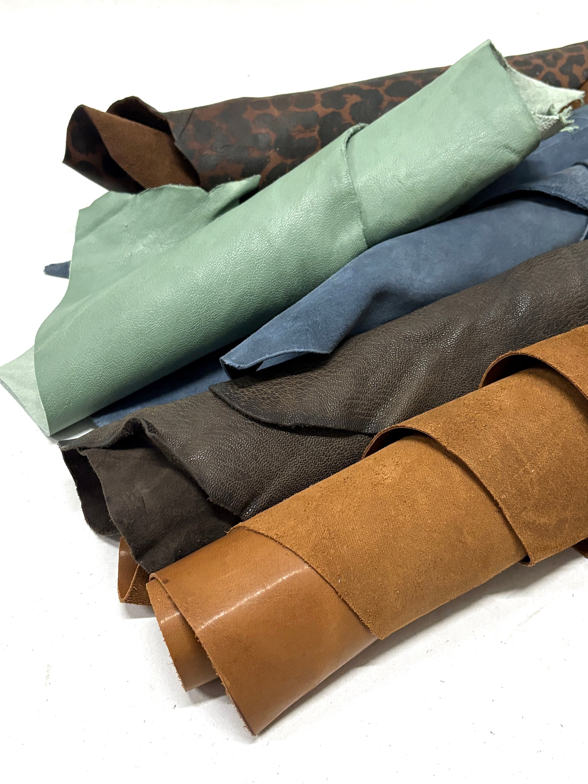 Collection of various coloured leather rolls