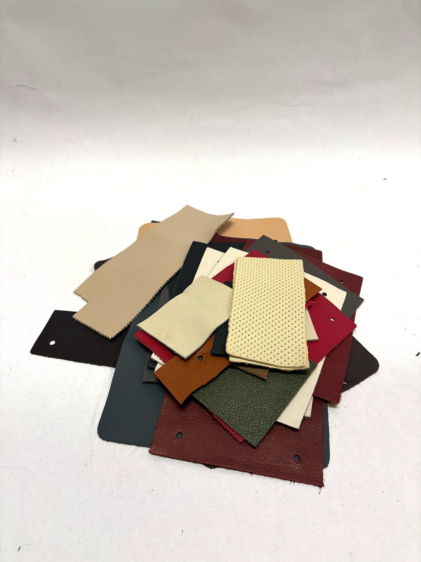 Collection of leather colour swatches with various sizes 
