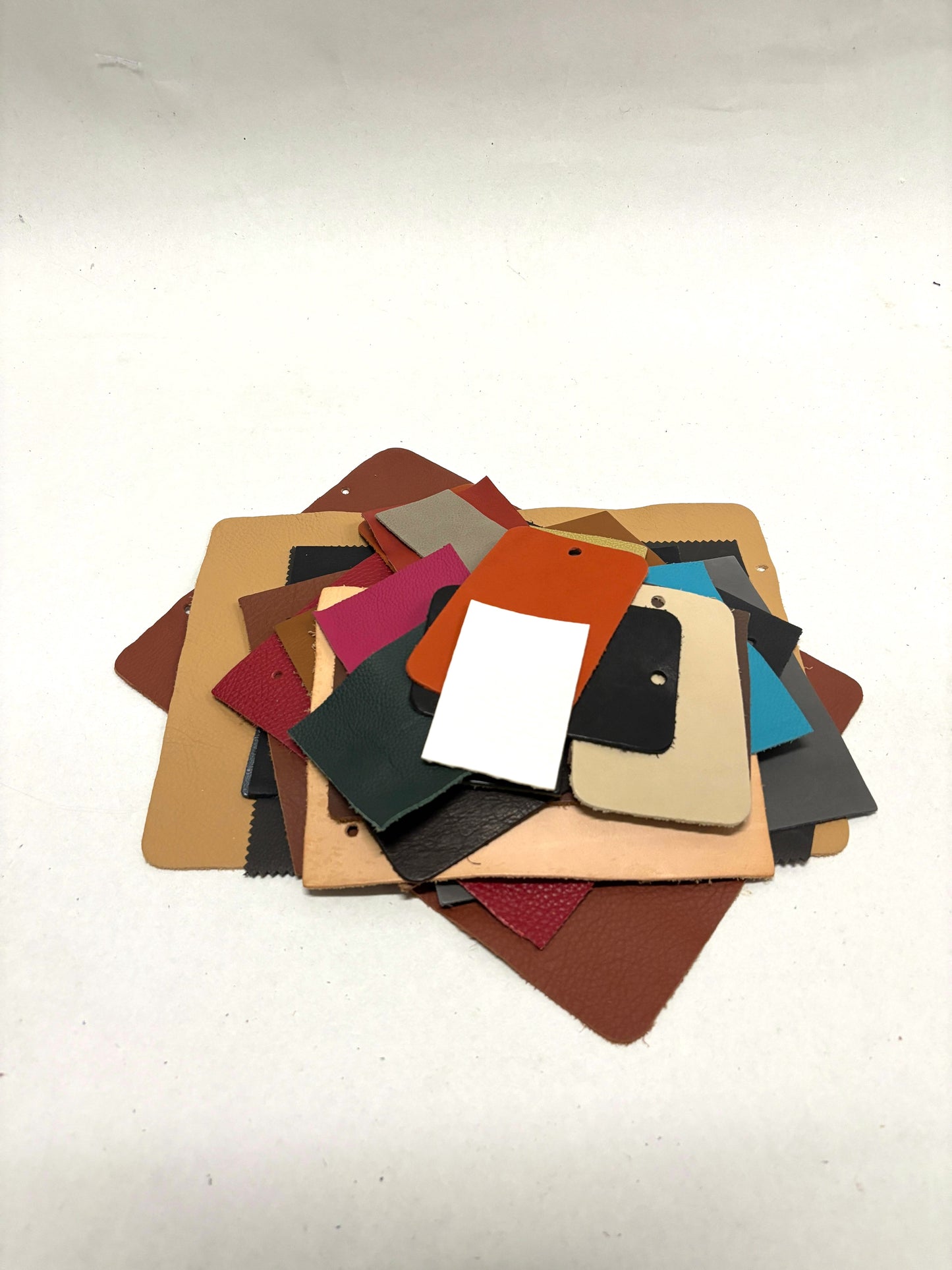 Collection of leather colour swatches with various sizes 