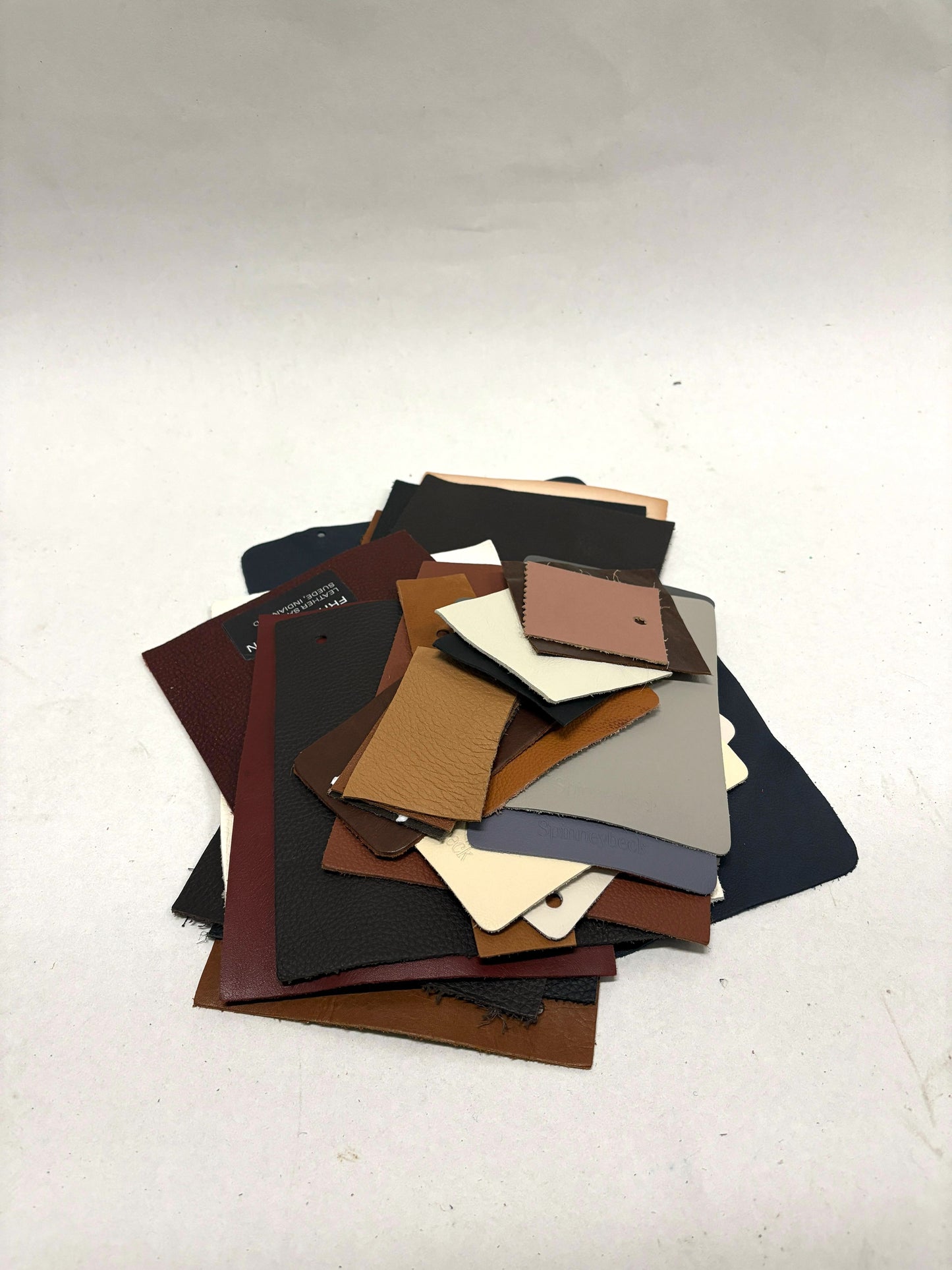 Collection of leather colour swatches with various sizes 