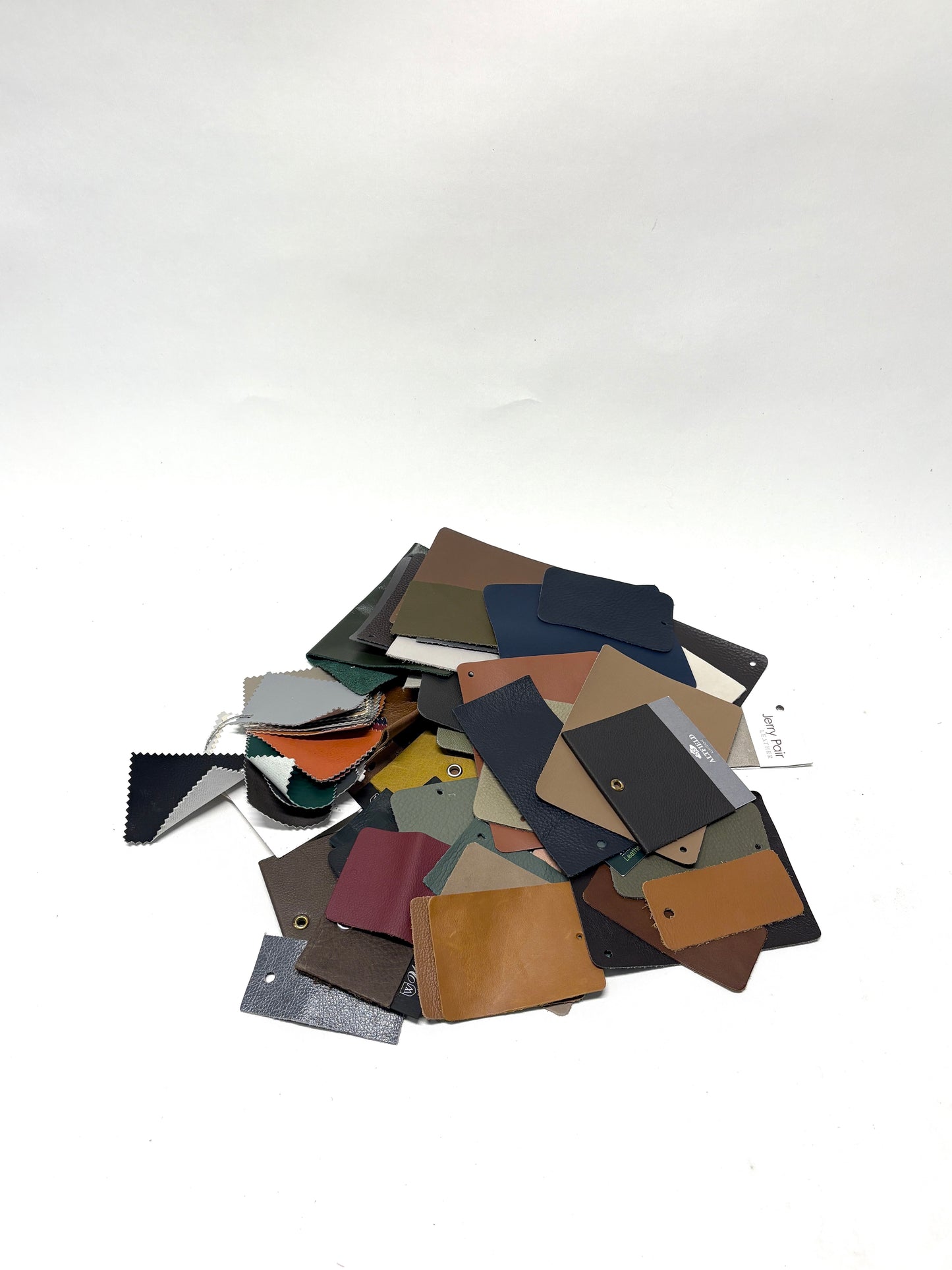 Collection of leather colour swatches with various sizes 
